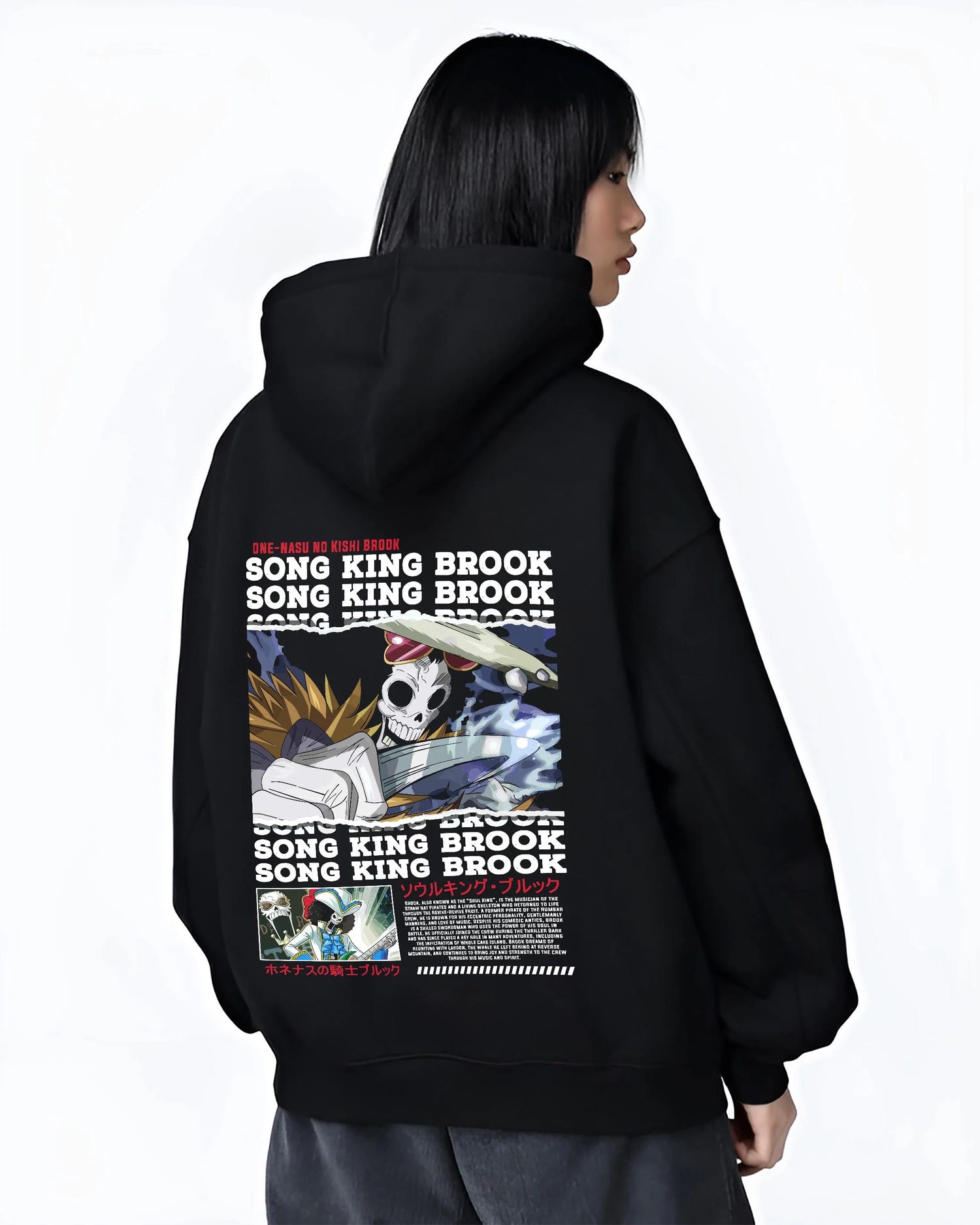 Black hoodie worn by female model, back view with Brook Hoodie One Piece Soul King Retro Music Poster graphic streetwear graphic.