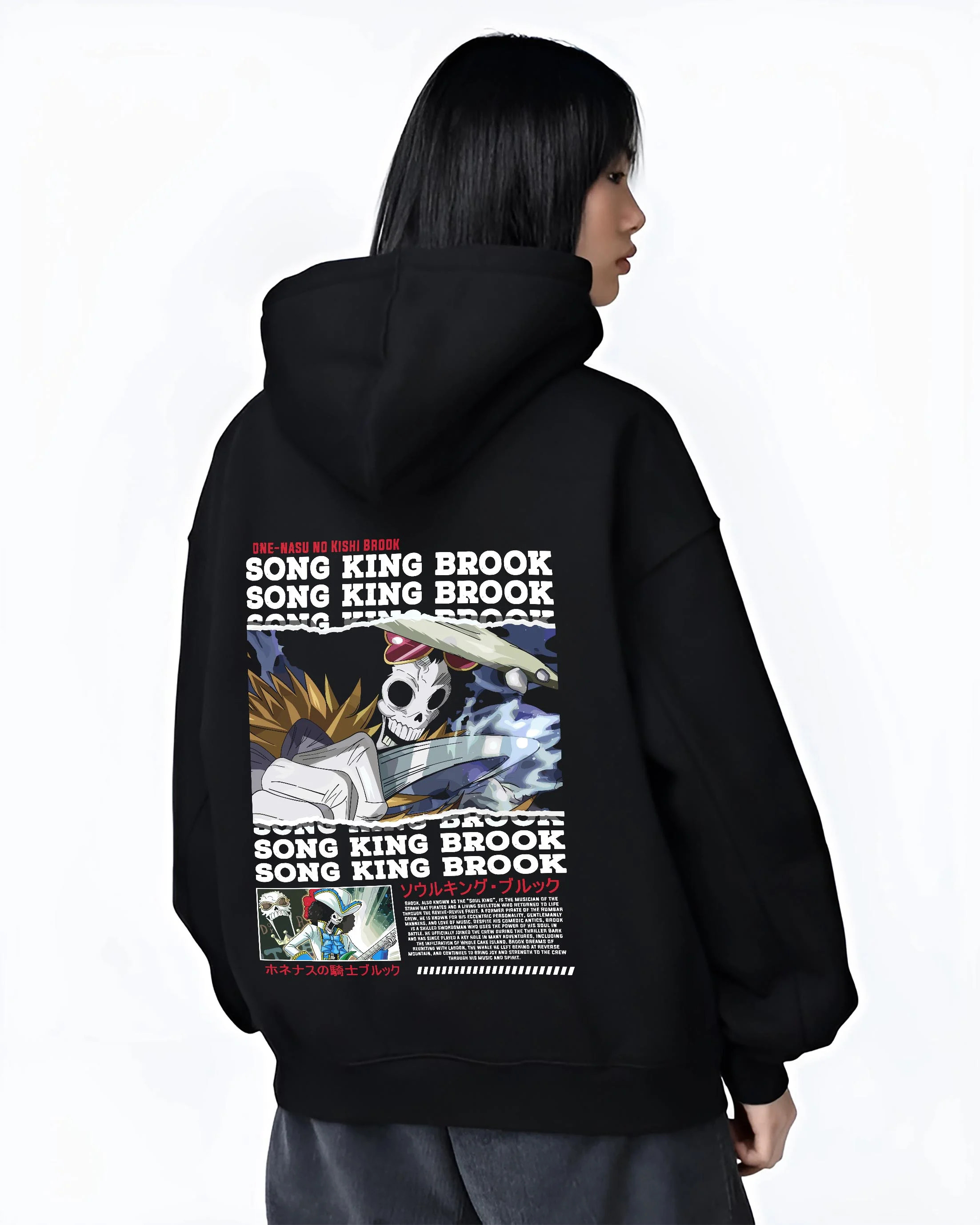 Black hoodie worn by female model, back view with Brook Hoodie One Piece Soul King Retro Music Poster graphic streetwear graphic.
