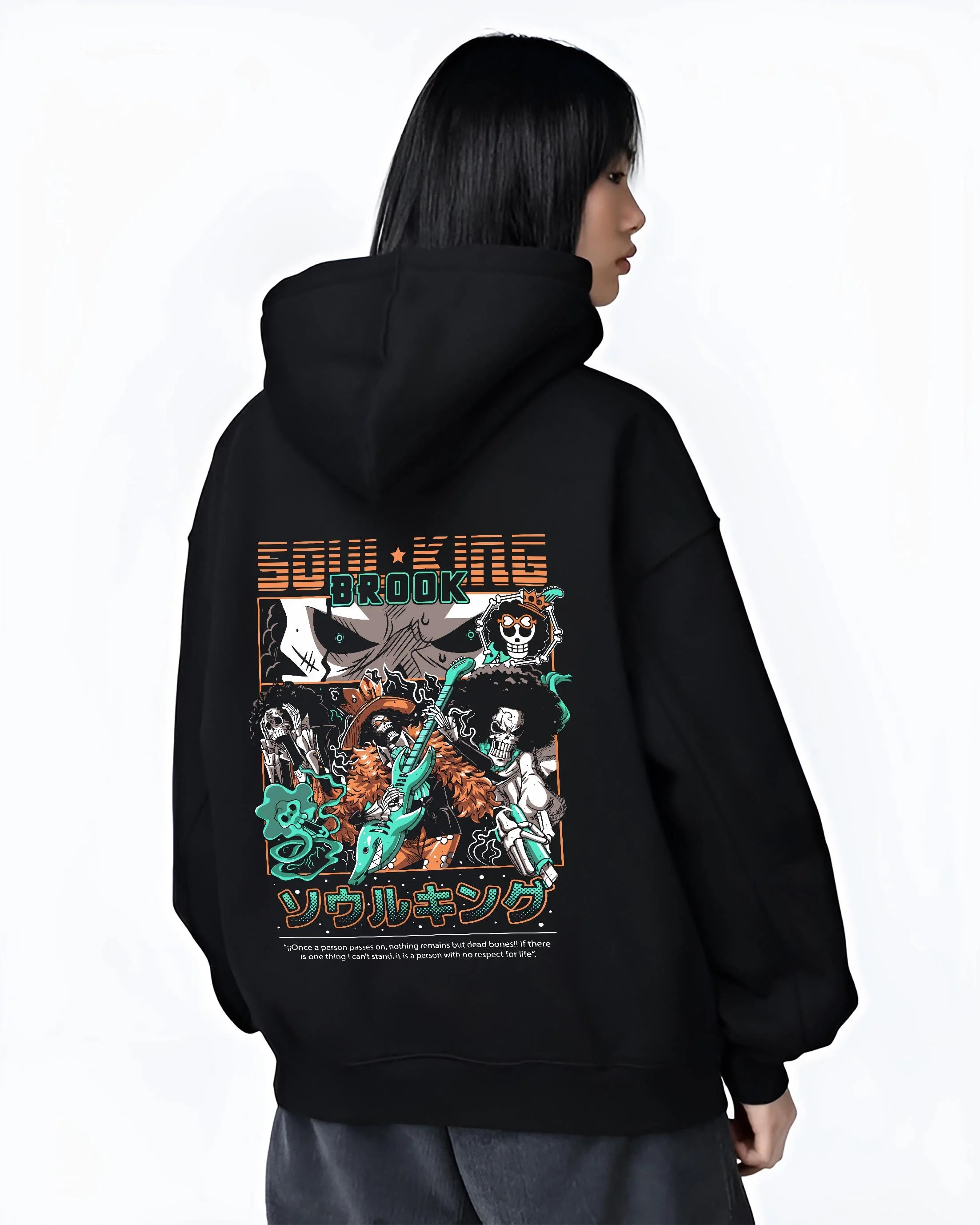 Black hoodie worn by female model, back view with Brook Soul King Hoodie One Piece Flame Music Scene graphic premium wear.