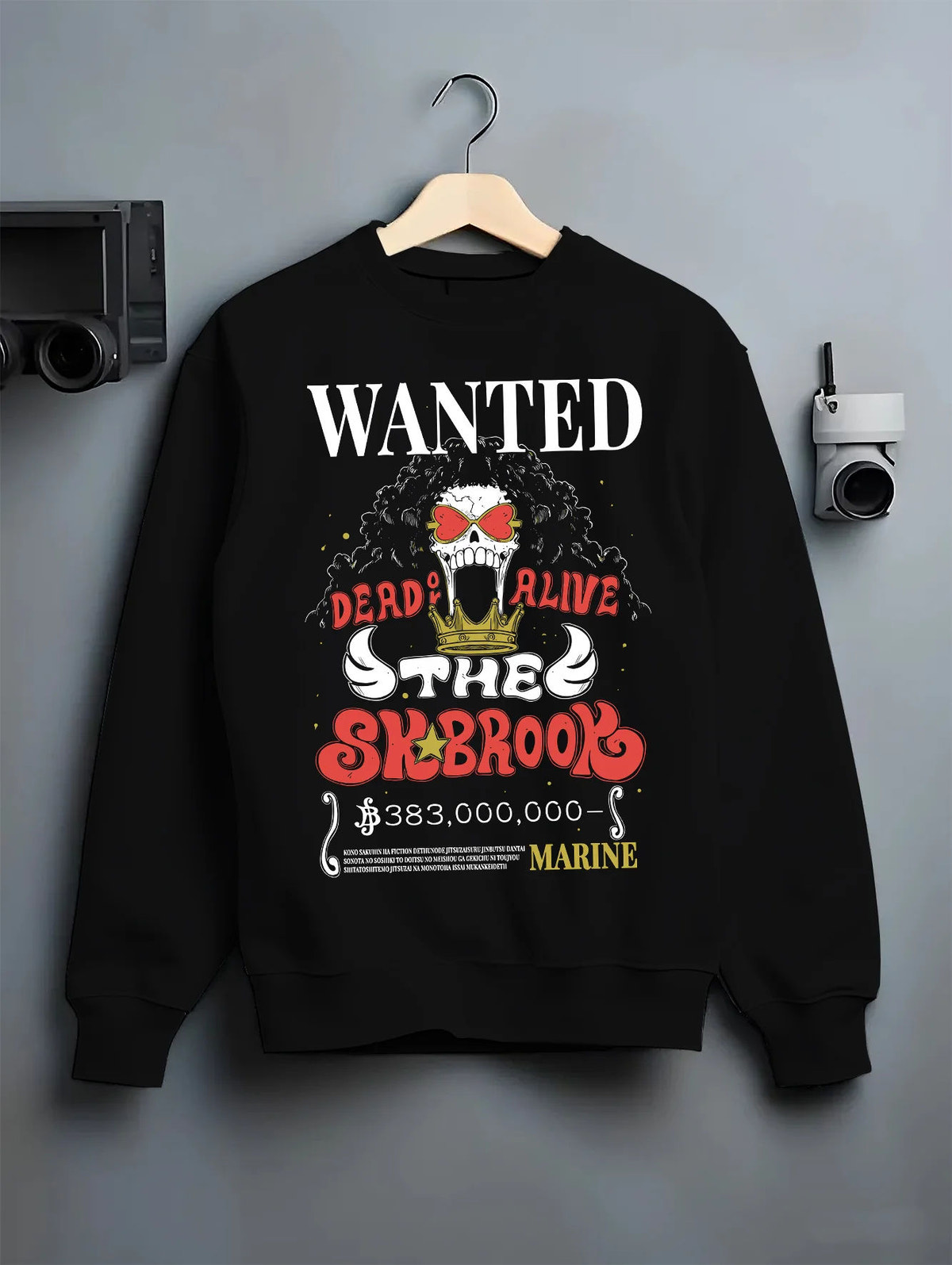 Black crewneck sweatshirt on hanger with Brook wanted poster from One Piece illustrated back graphic