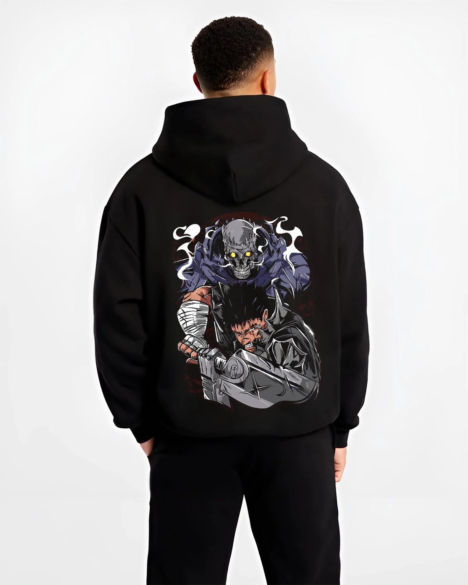 Black hoodie worn by male model, back view with Guts Berserk Hoodie Eclipse Hero Dark Blade Poster graphic premium wear.