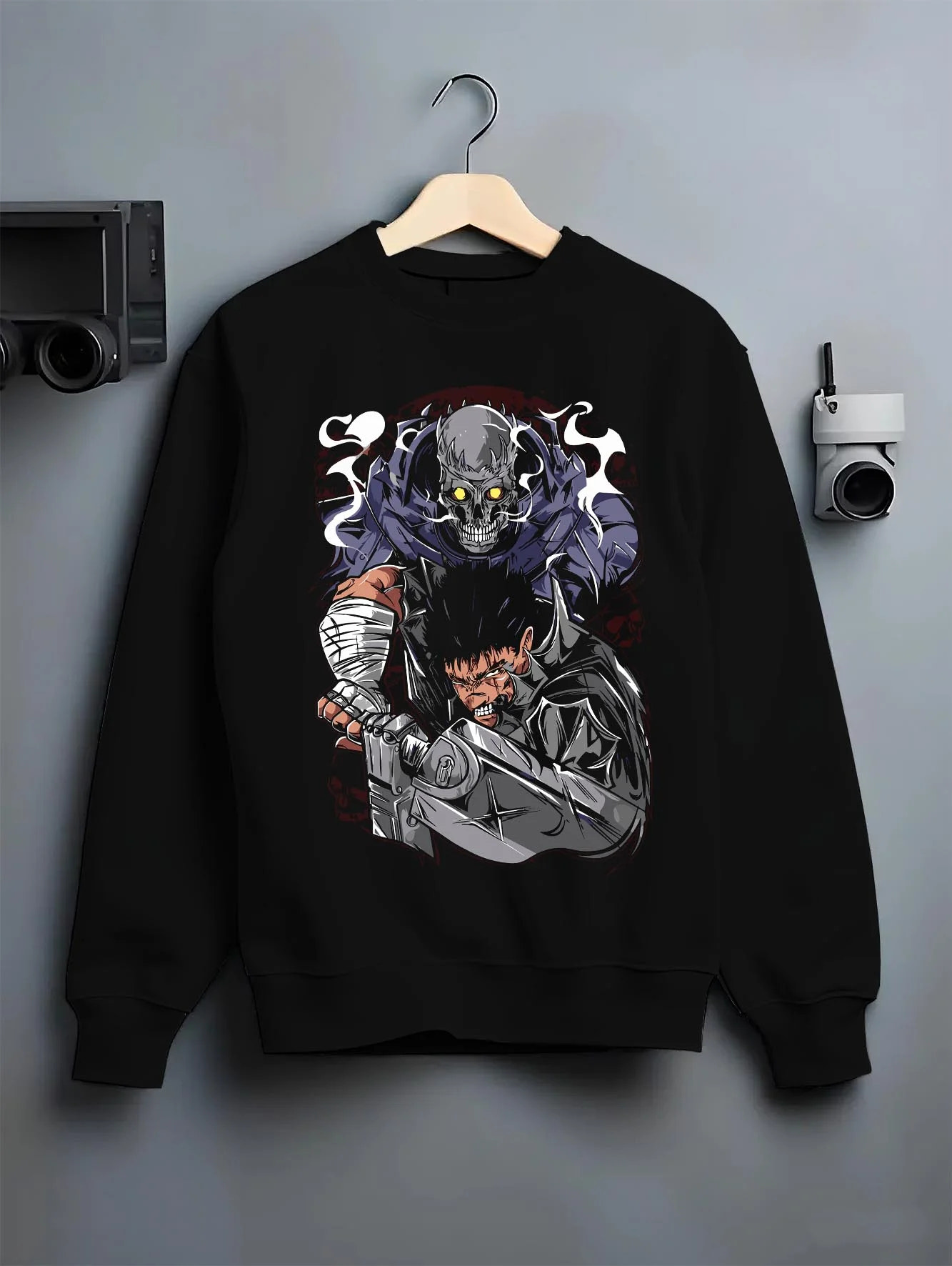 Black crewneck sweatshirt on hanger with Guts Berserk Hoodie Eclipse Hero Dark Blade Poster graphic Guts themed artwork.