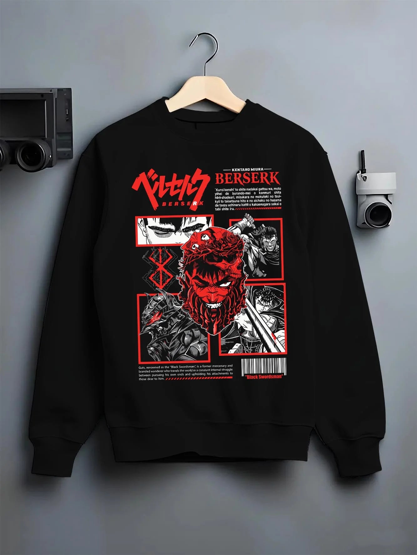 Black crewneck sweatshirt on hanger with Berserk Eclipse Hoodie Bloody Behelit Red Demon Face graphic streetwear graphic.