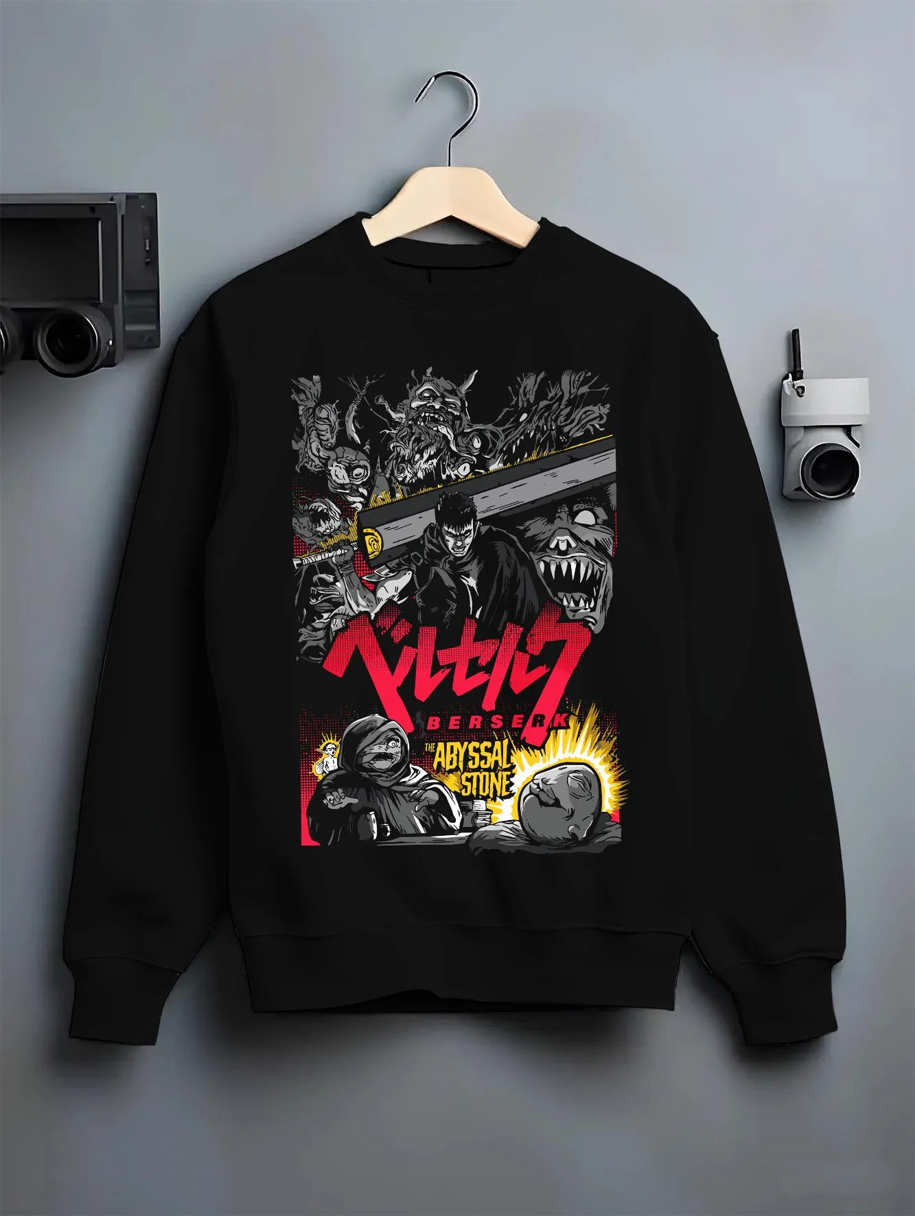 Black crewneck sweatshirt on hanger with Berserk Abyss Hoodie Guts Wielding Dragon Slayer Sword graphic Guts anime design.