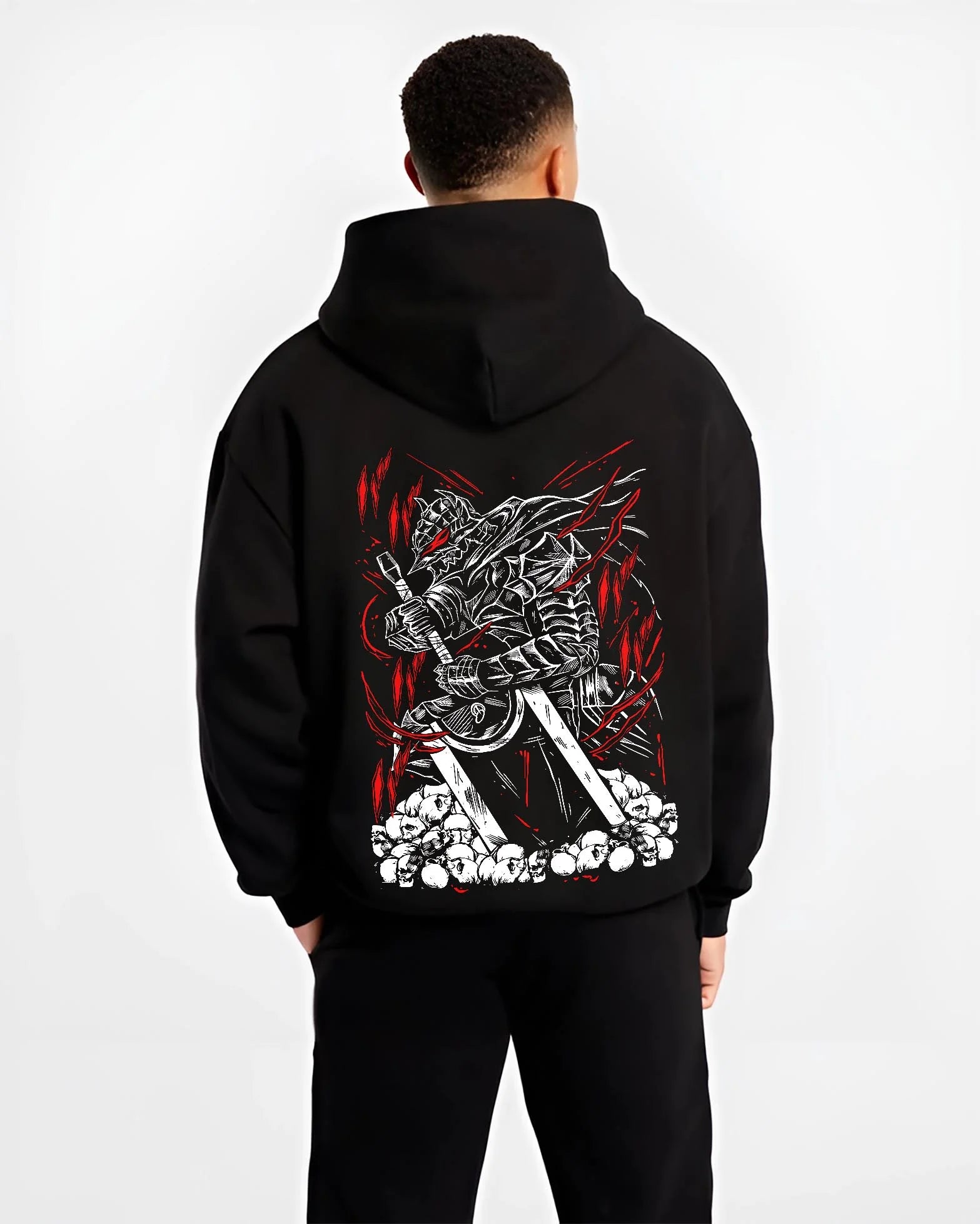 Black hoodie worn by male model, back view with Berserk Armour Hoodie Guts Berserker Armour Strike graphic Guts themed artwork.