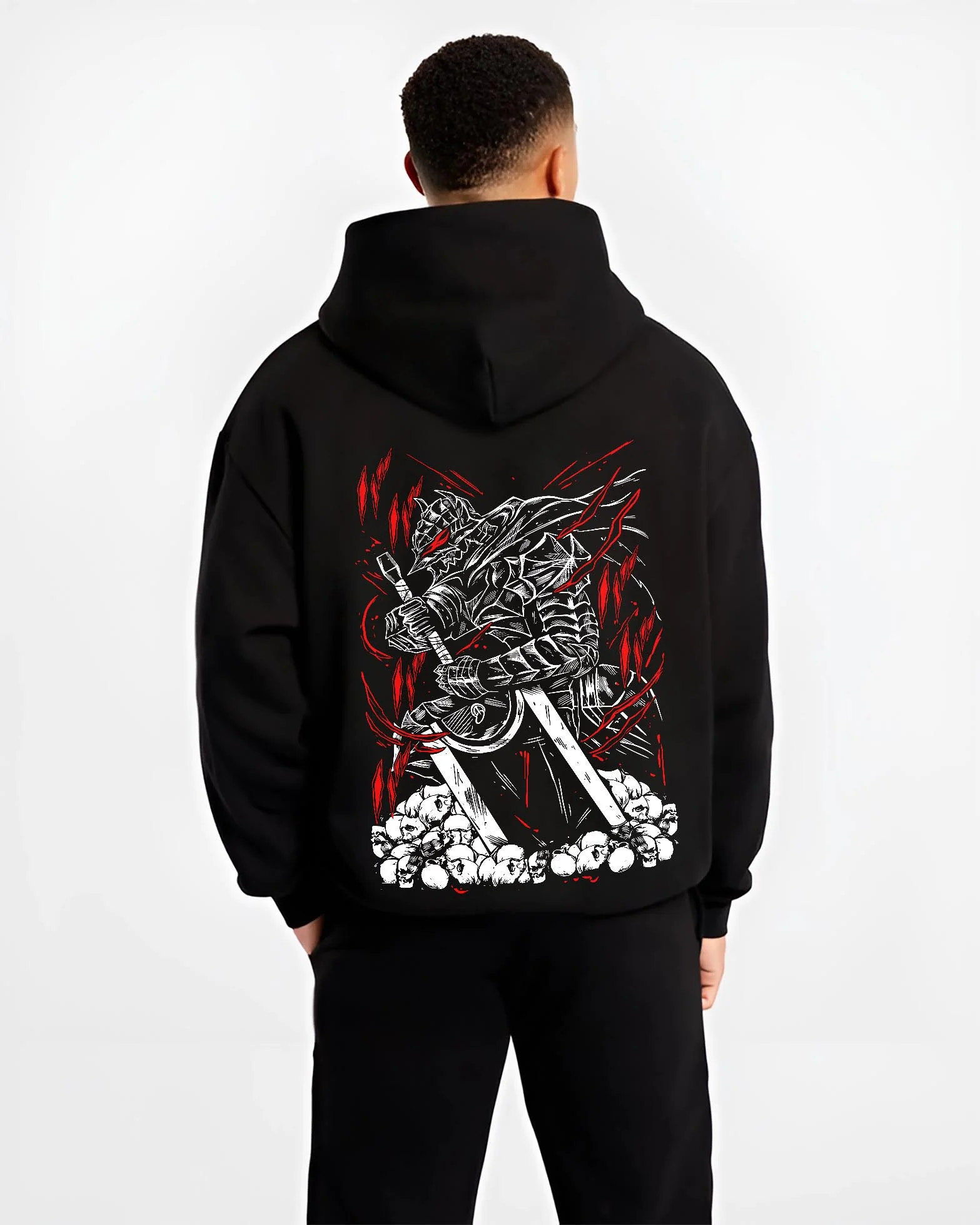 Black hoodie worn by male model, back view with Berserk Armour Hoodie Guts Berserker Armour Strike graphic Guts themed artwork.