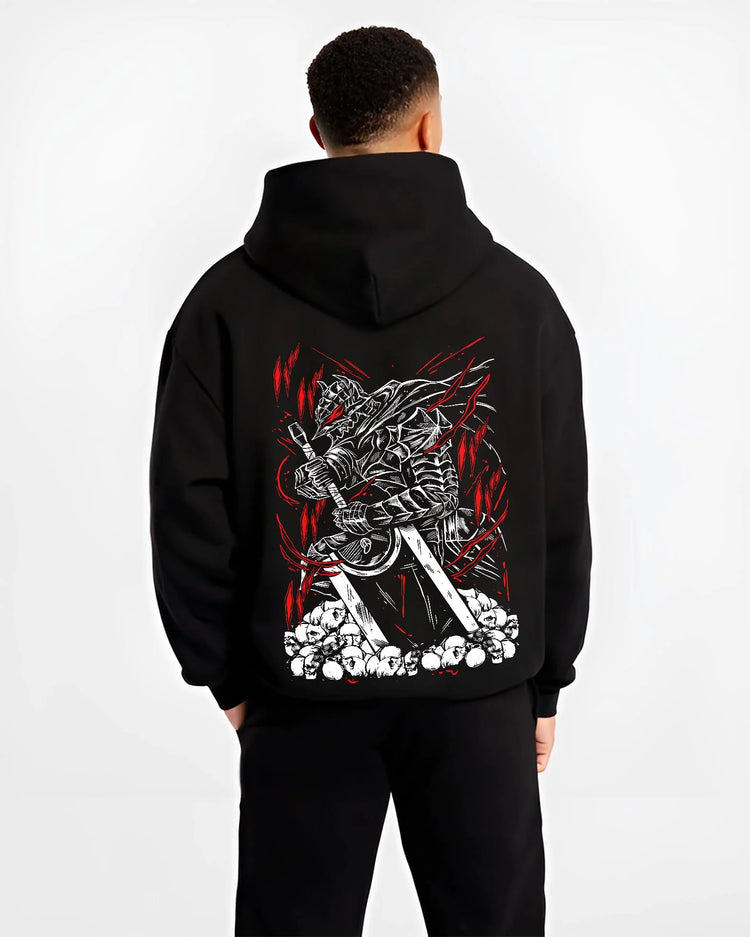 Black hoodie worn by male model, back view with Berserk Armour Hoodie Guts Berserker Armour Strike graphic Guts themed artwork.