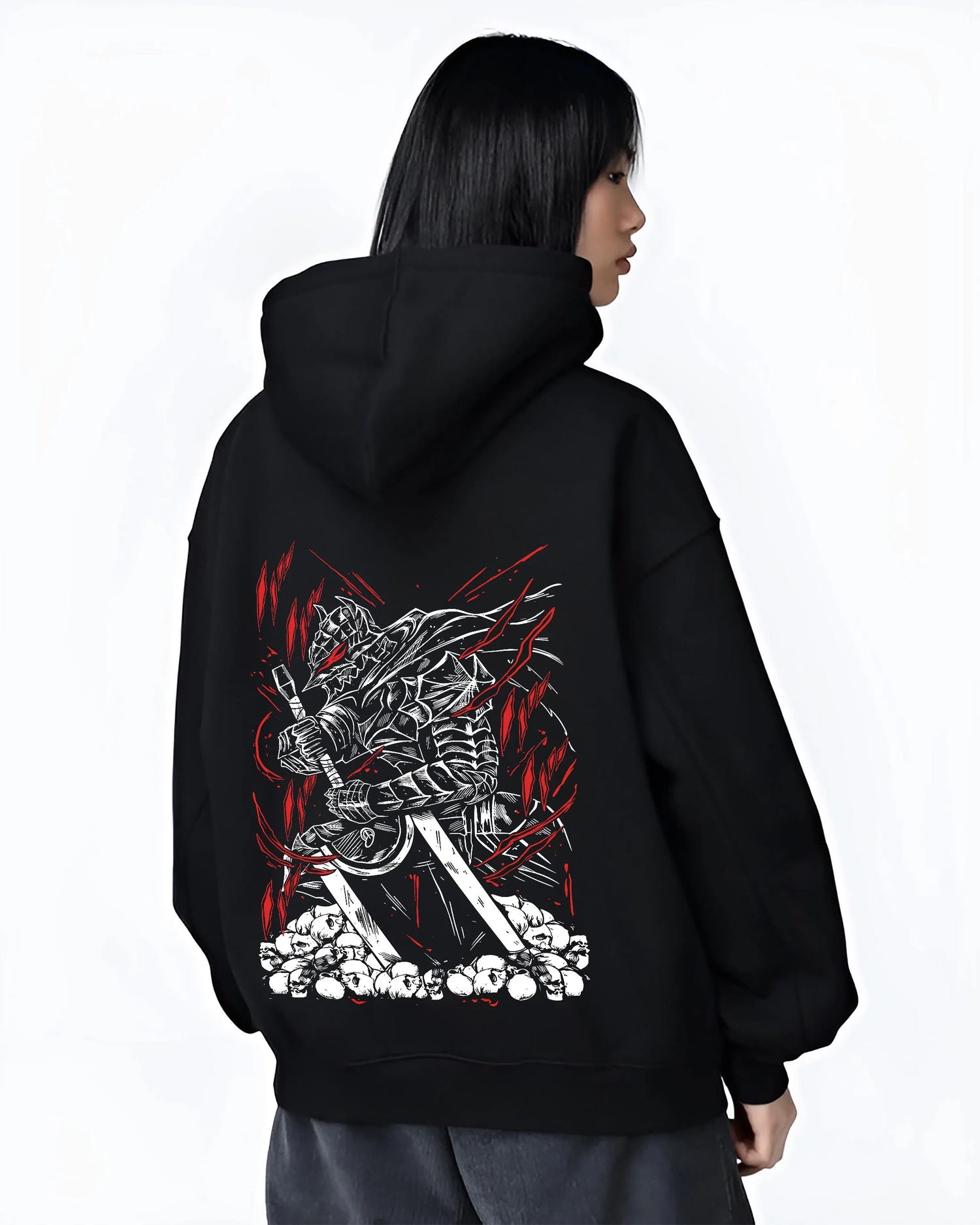 Black hoodie worn by female model, back view with Berserk Armour Hoodie Guts Berserker Armour Strike graphic Guts anime design.
