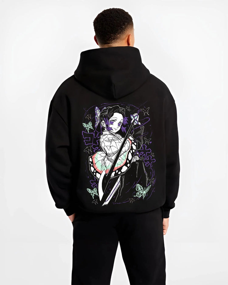 Black hoodie worn by male model from the back featuring Shinobu Kocho Butterfly Dance Demon Slayer artwork.