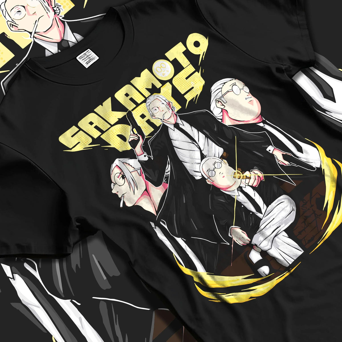 Black T-shirt laid flat with natural folds featuring Taro Sakamoto Sakamoto Days action artwork.