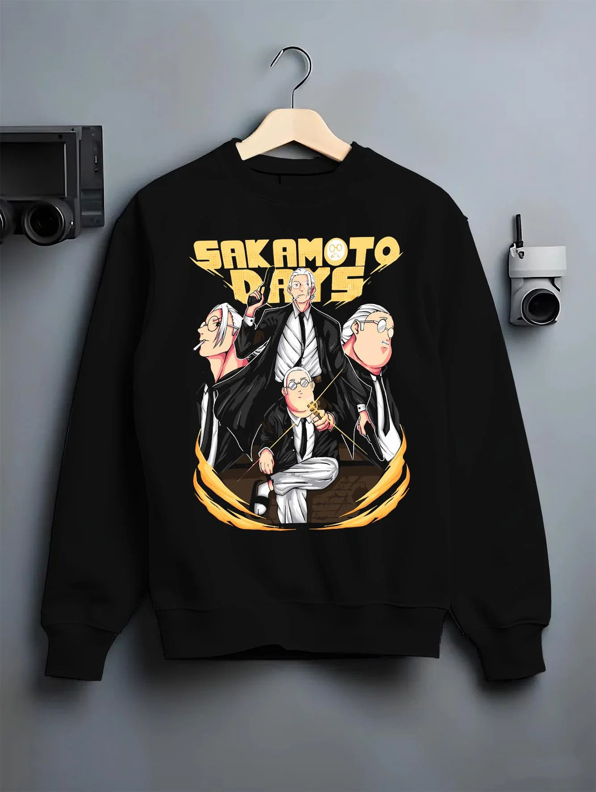 Black crewneck sweatshirt on hanger featuring Taro Sakamoto Sakamoto Days action artwork.