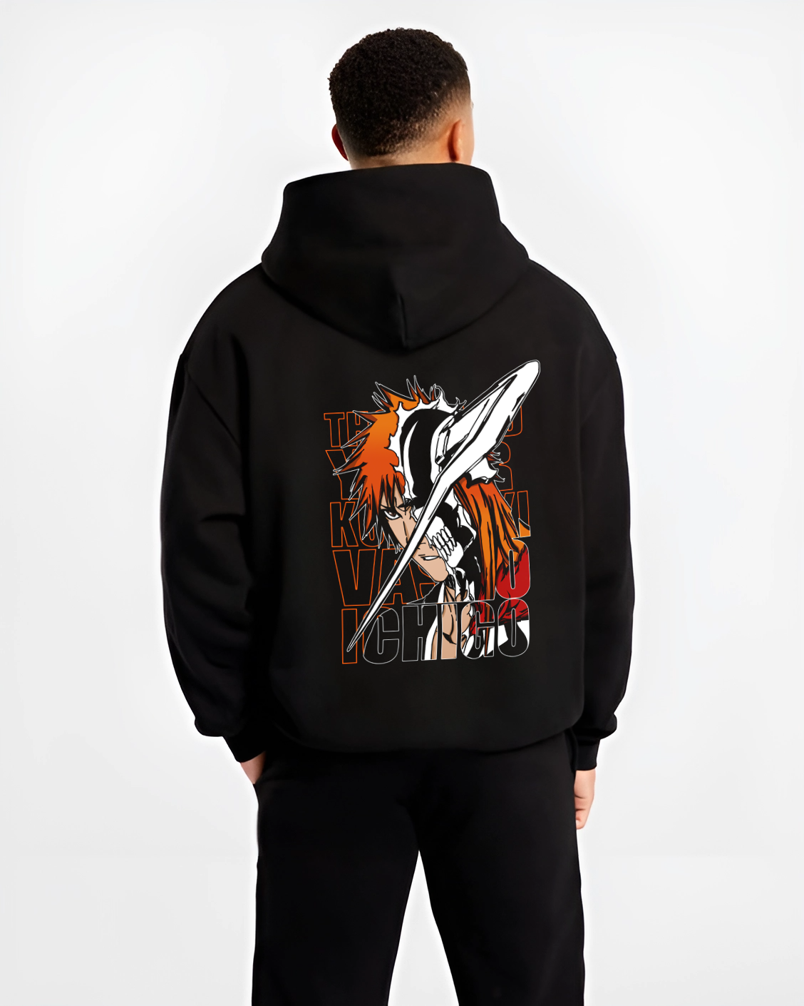 Black hoodie worn by a male model, back view, featuring Bleach Ichigo Kurosaki Vasto Lorde shonen battle character artwork with bold manga panel inspired design.