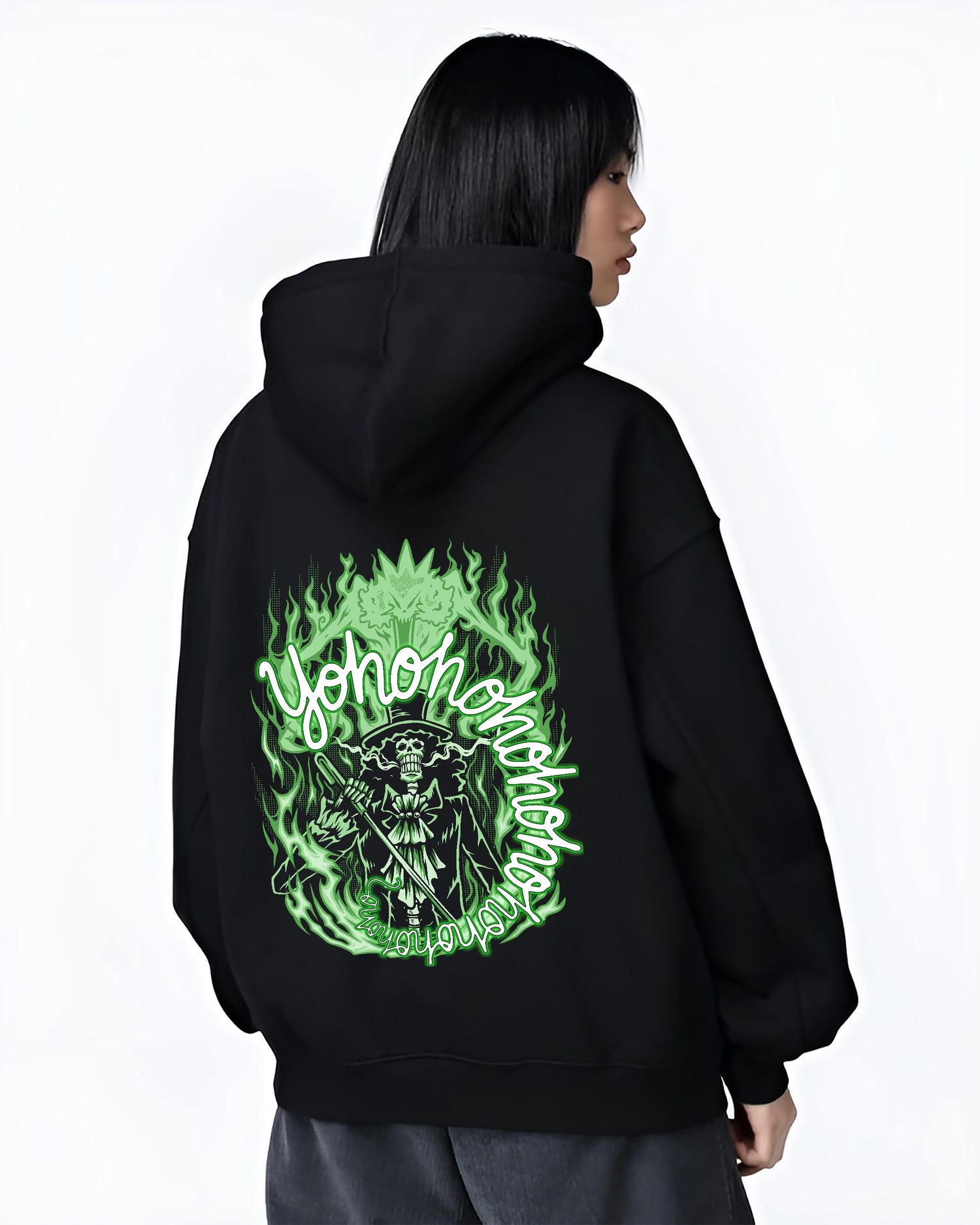 Black hoodie worn by a female model, back view, featuring One Piece Brook Japanese animation streetwear design with glowing green ghostly flame retro manga artwork.
