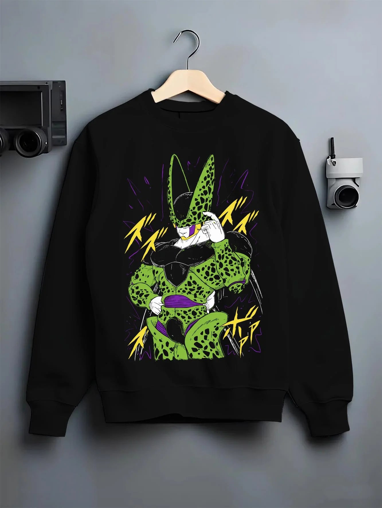 Black crewneck sweatshirt on hanger with Cell Second Form Hoodie Dragon Ball Z Villain Stance graphic bold anime graphic.