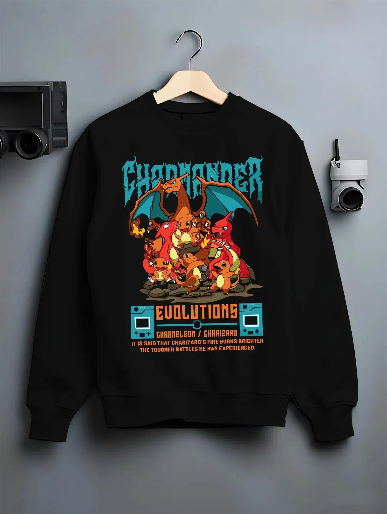 Black crewneck sweatshirt on hanger with Charizard Hoodie Pokémon Evolutions Retro Flame Hero graphic premium wear.