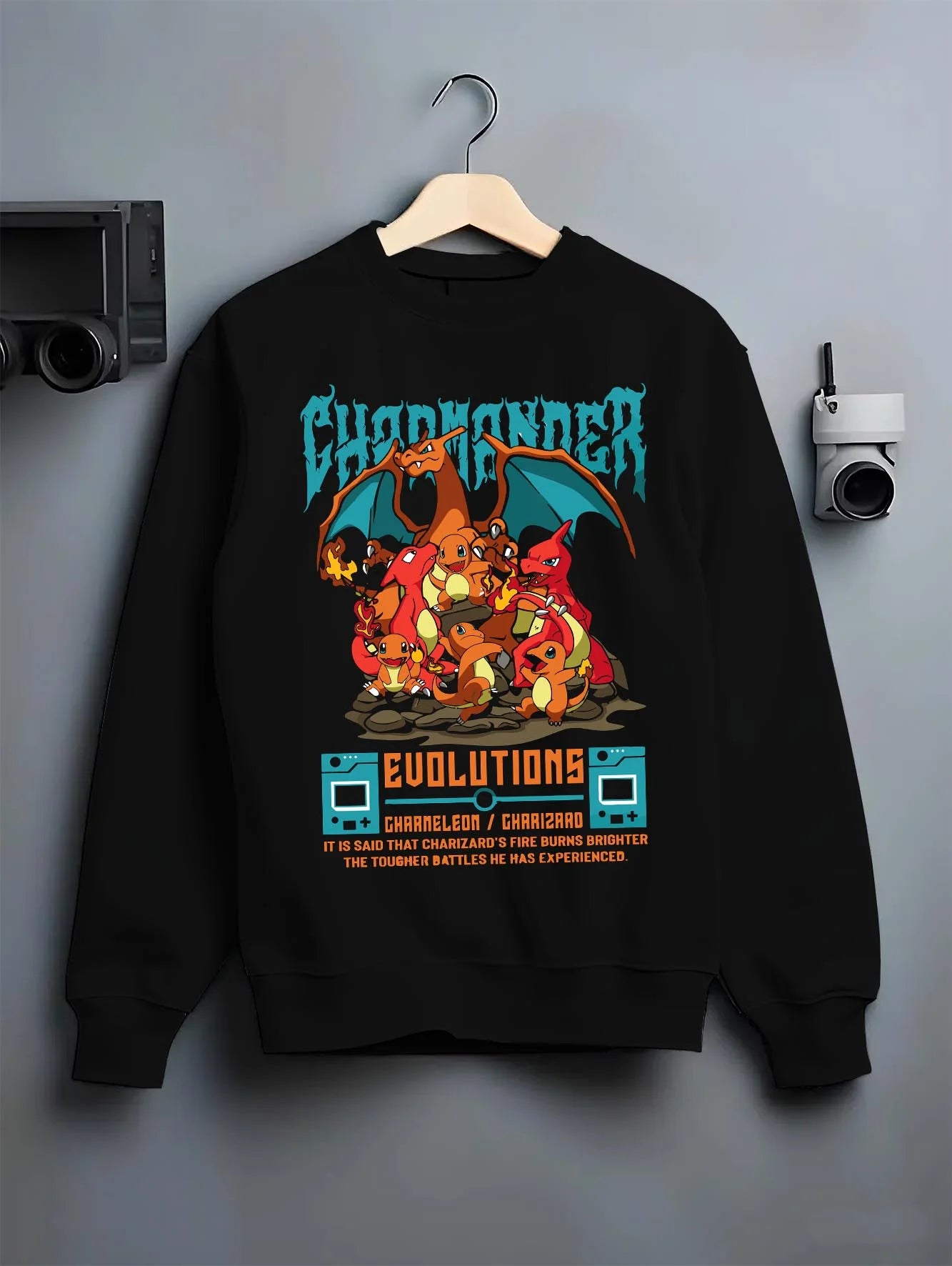 Black crewneck sweatshirt on hanger with Charizard Hoodie Pokémon Evolutions Retro Flame Hero graphic premium wear.