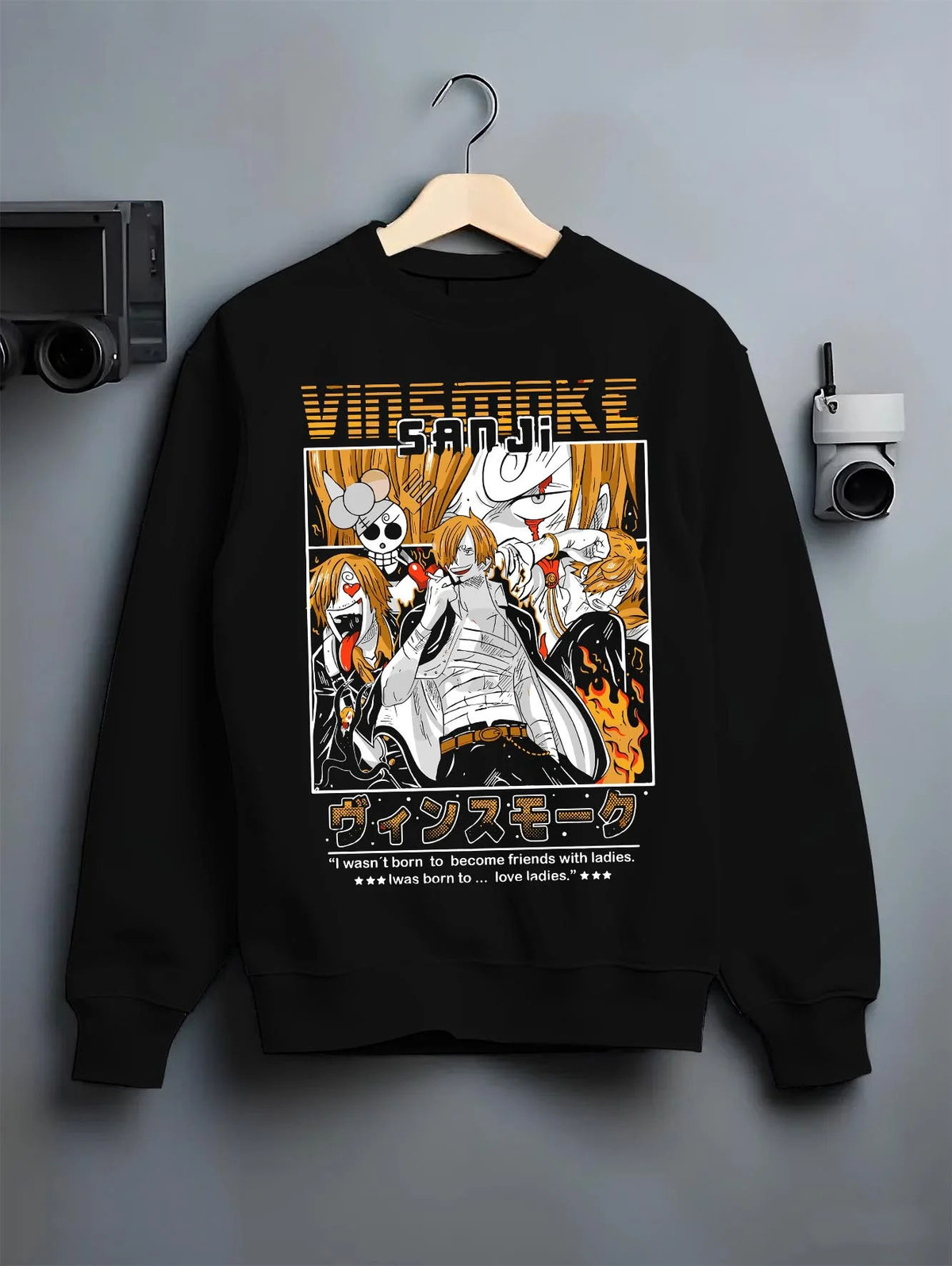 Black crewneck sweatshirt on hanger featuring Sanji Chef One Piece Straw Hat artwork.