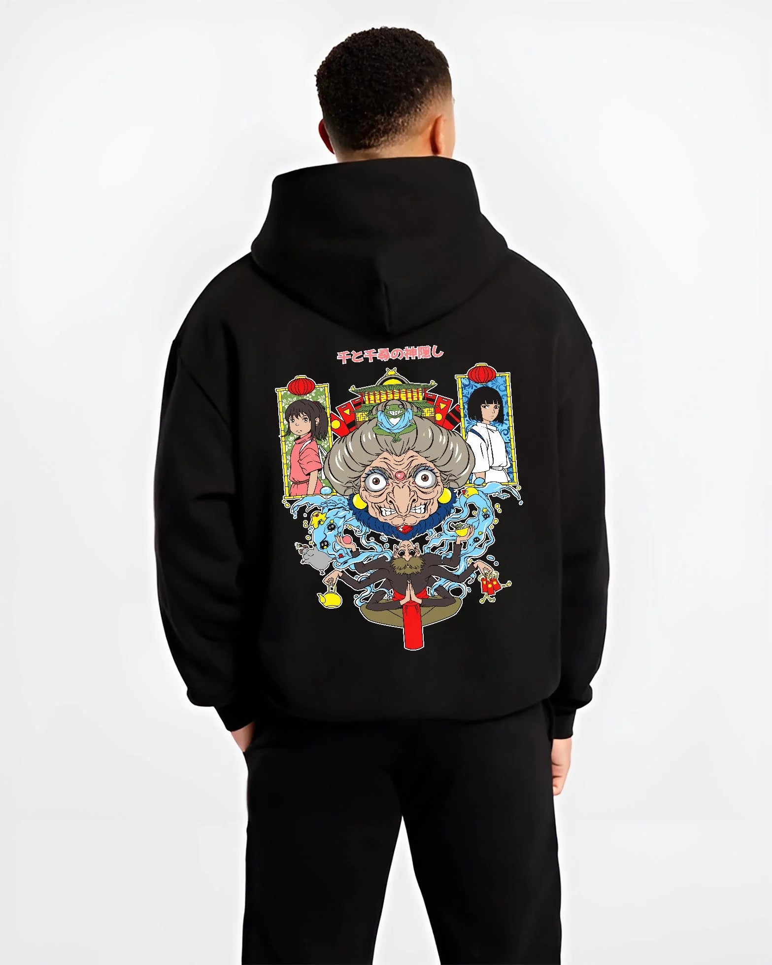 Black hoodie worn by male model, back view with Spirited Away Hoodie Yubaba Studio Ghibli Retro Scene graphic streetwear graphic.