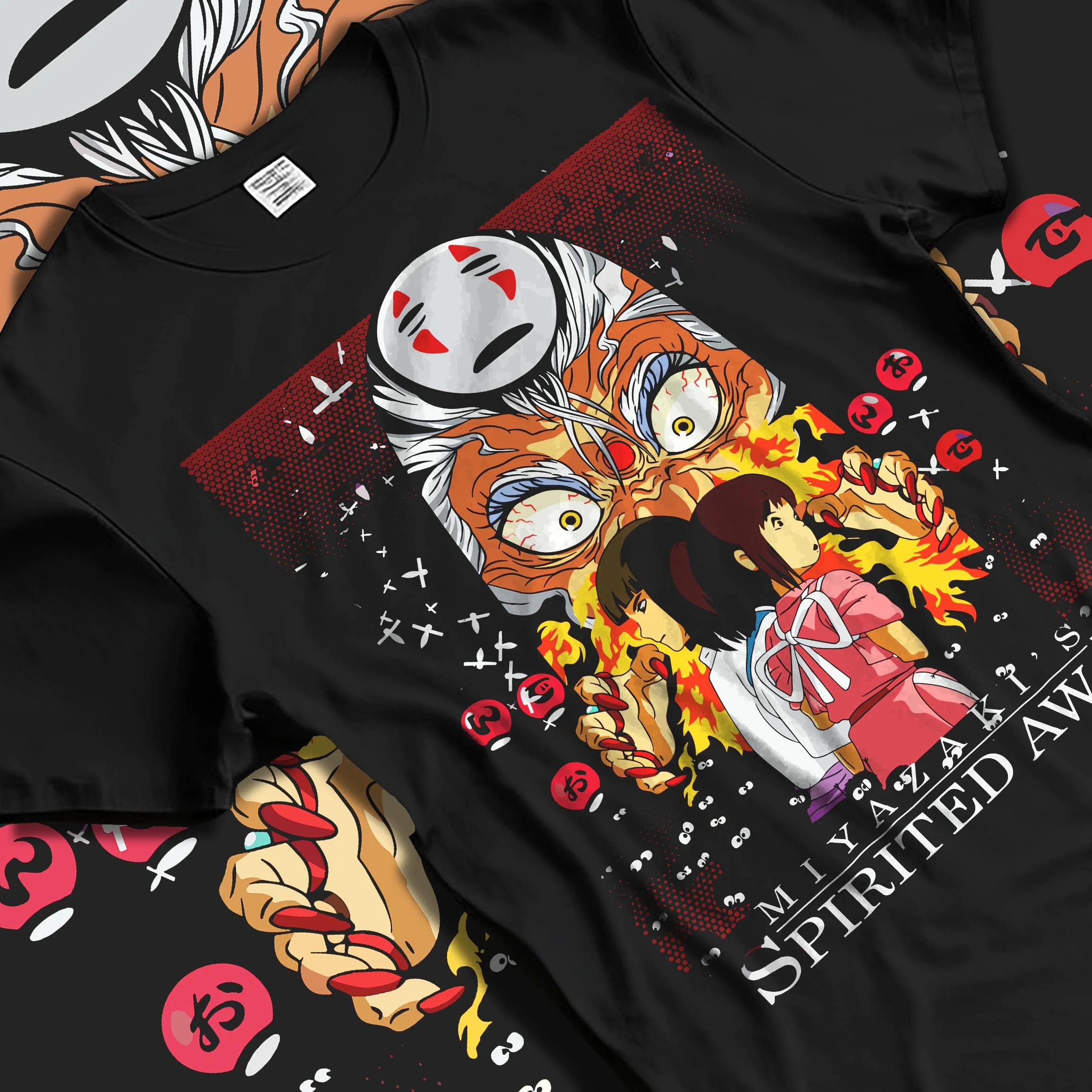 Black T-shirt laid flat with natural folds with Spirited Away Hoodie No Face Studio Ghibli Poster graphic streetwear graphic.