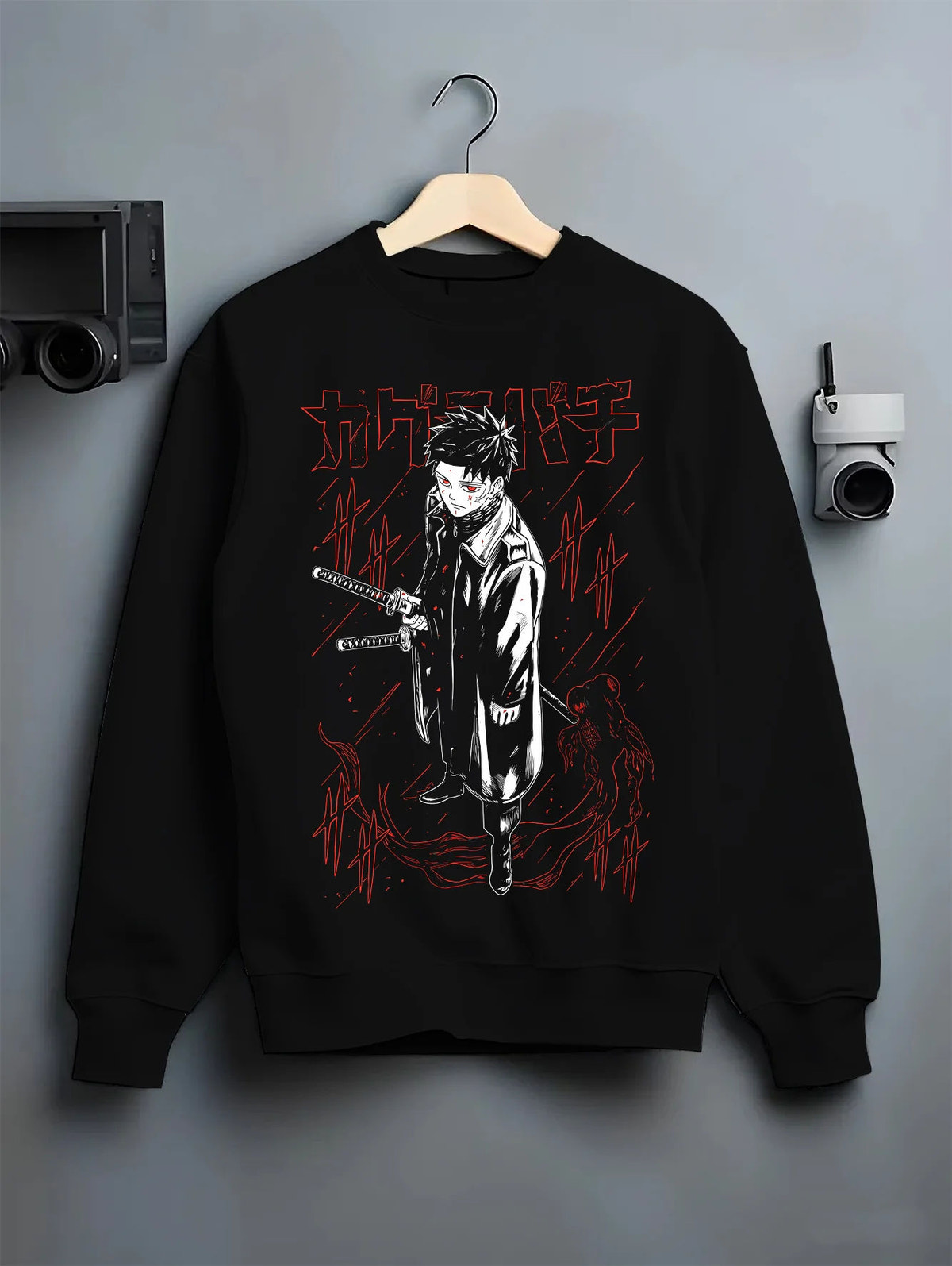 Black crewneck sweatshirt on hanger showing Chihiro Rokuhira from Kagurabachi: sword and dark manga art
