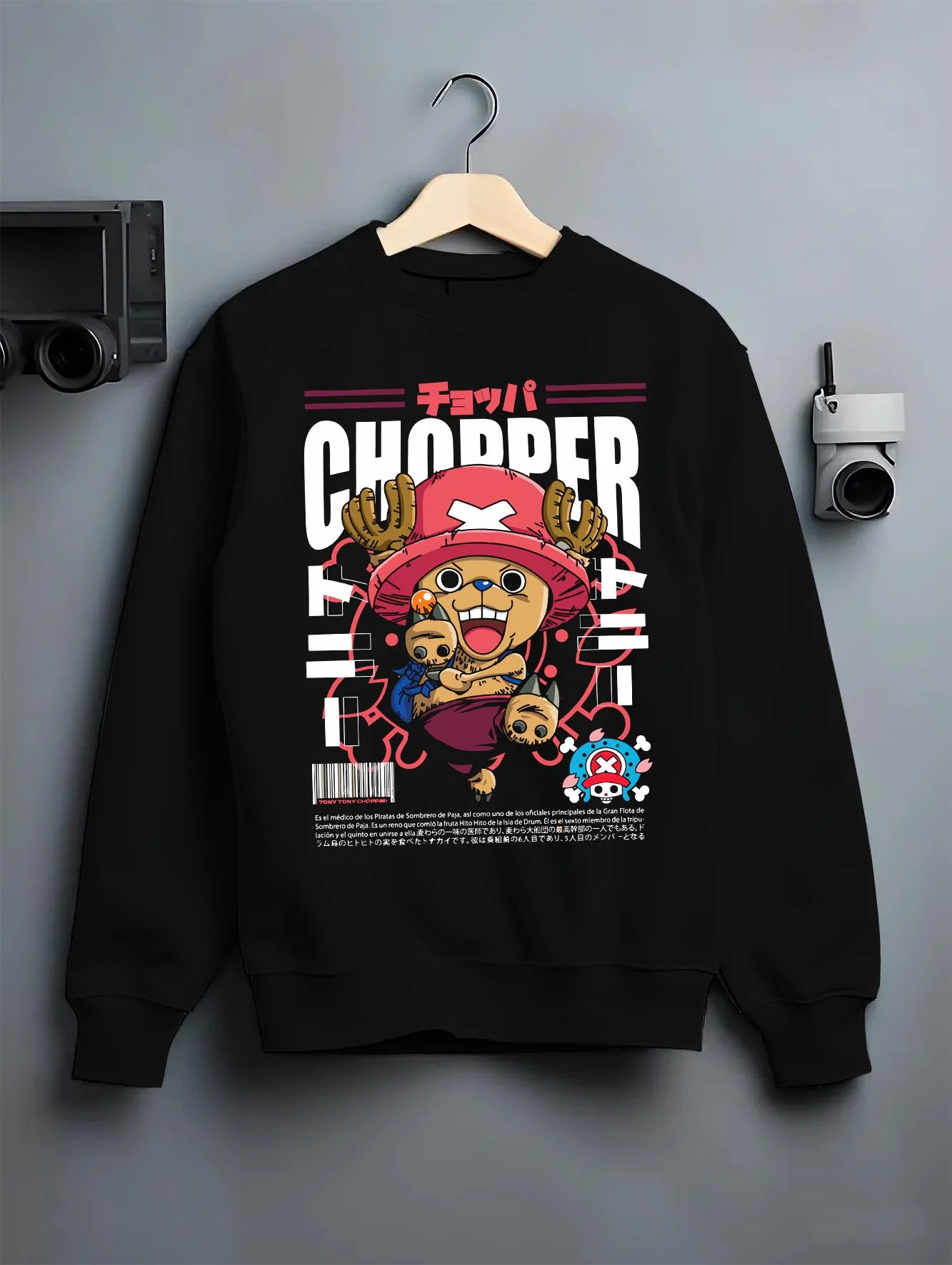 Black crewneck sweatshirt on hanger with Chopper Hoodie One Piece Doctor Retro Pirate Poster graphic premium wear.