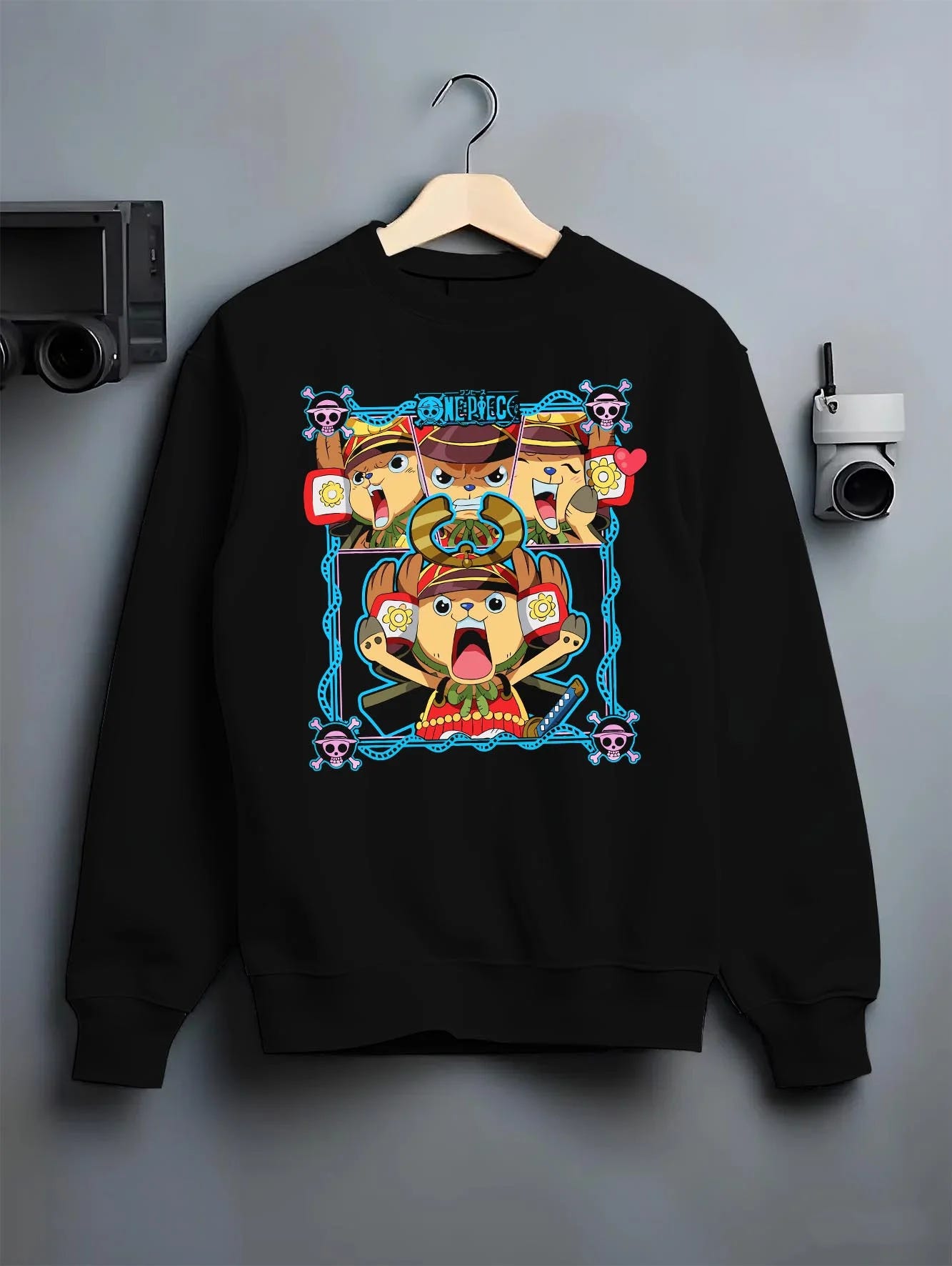 Black crewneck sweatshirt on hanger with Chopper Hoodie One Piece Doctor Pirate Retro Symbol graphic premium wear.