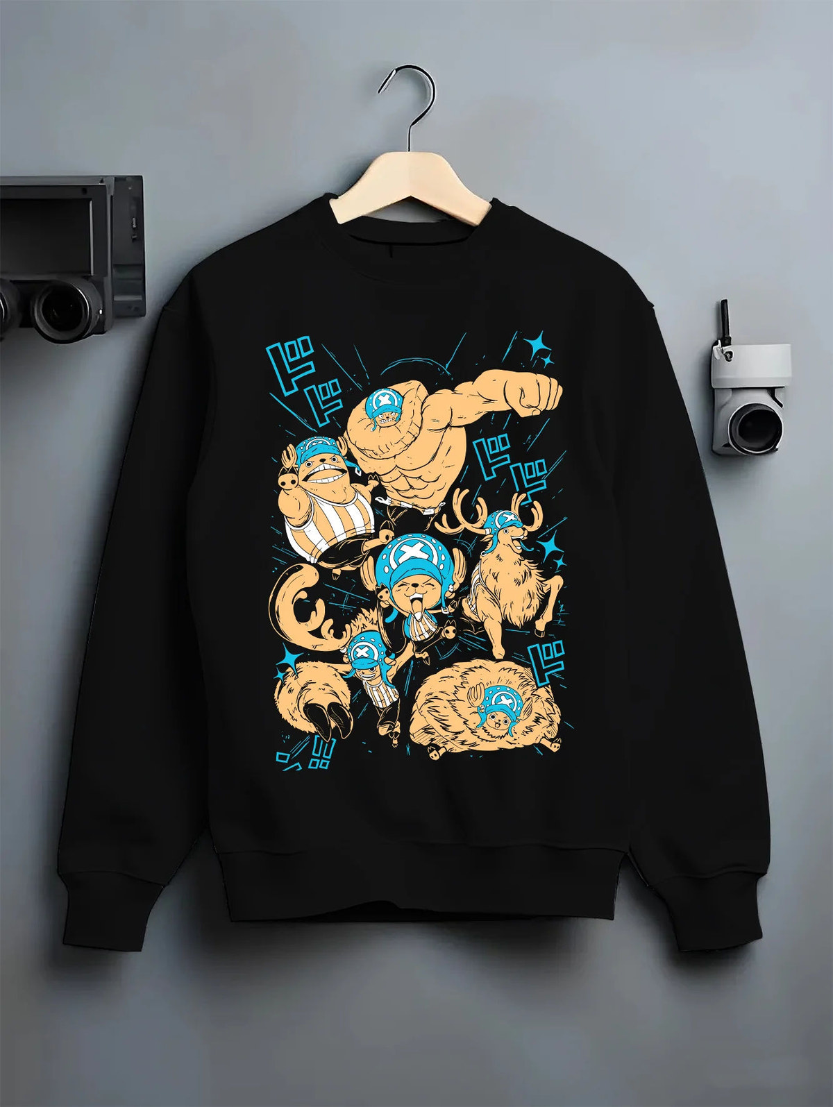 Black crewneck sweatshirt on hanger showing Tony Tony Chopper from One Piece: multiple transformed forms