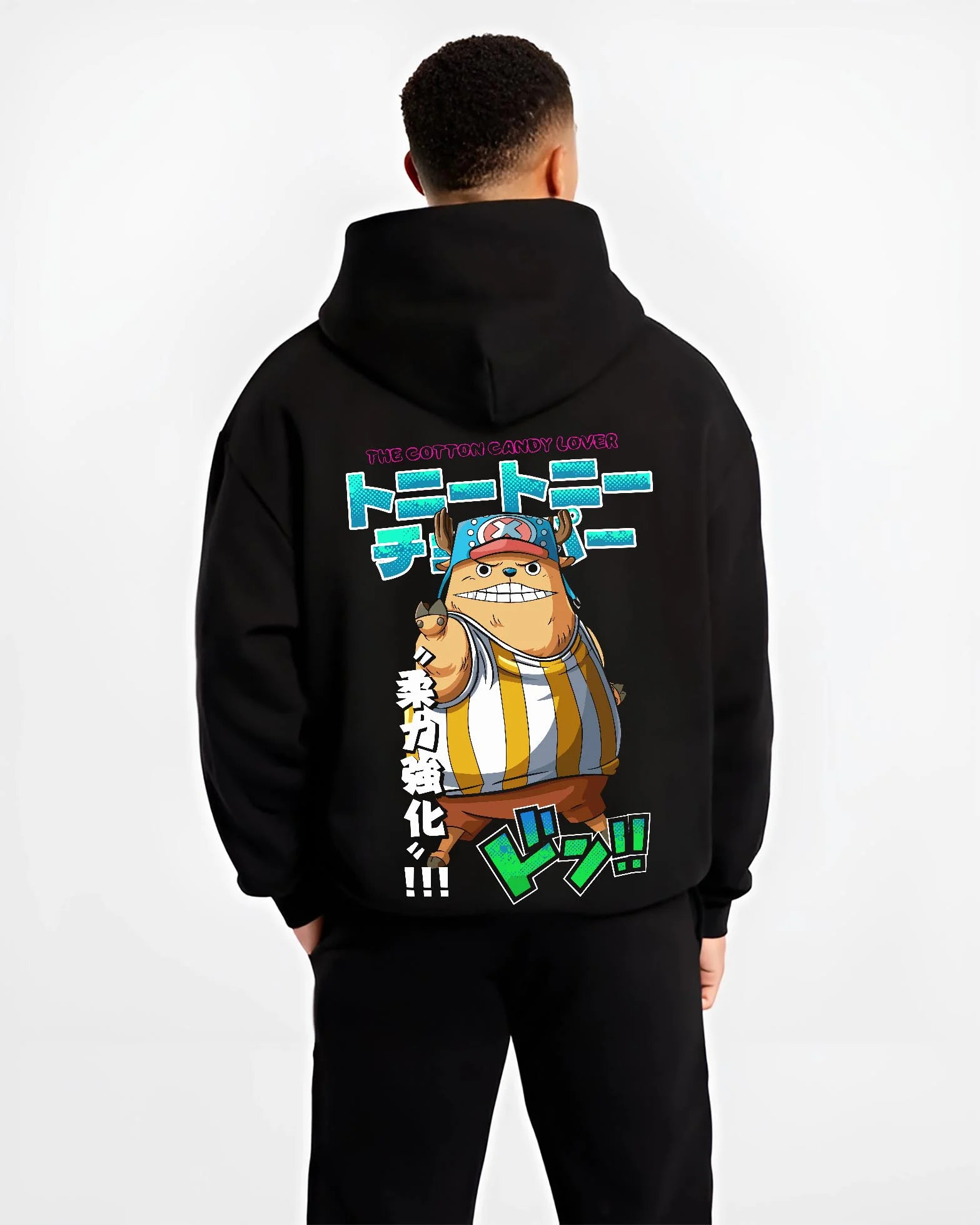 Black hoodie worn by male model, back view with Chopper Hoodie One Piece Pirate Straw Hat Crew Hero graphic streetwear graphic.