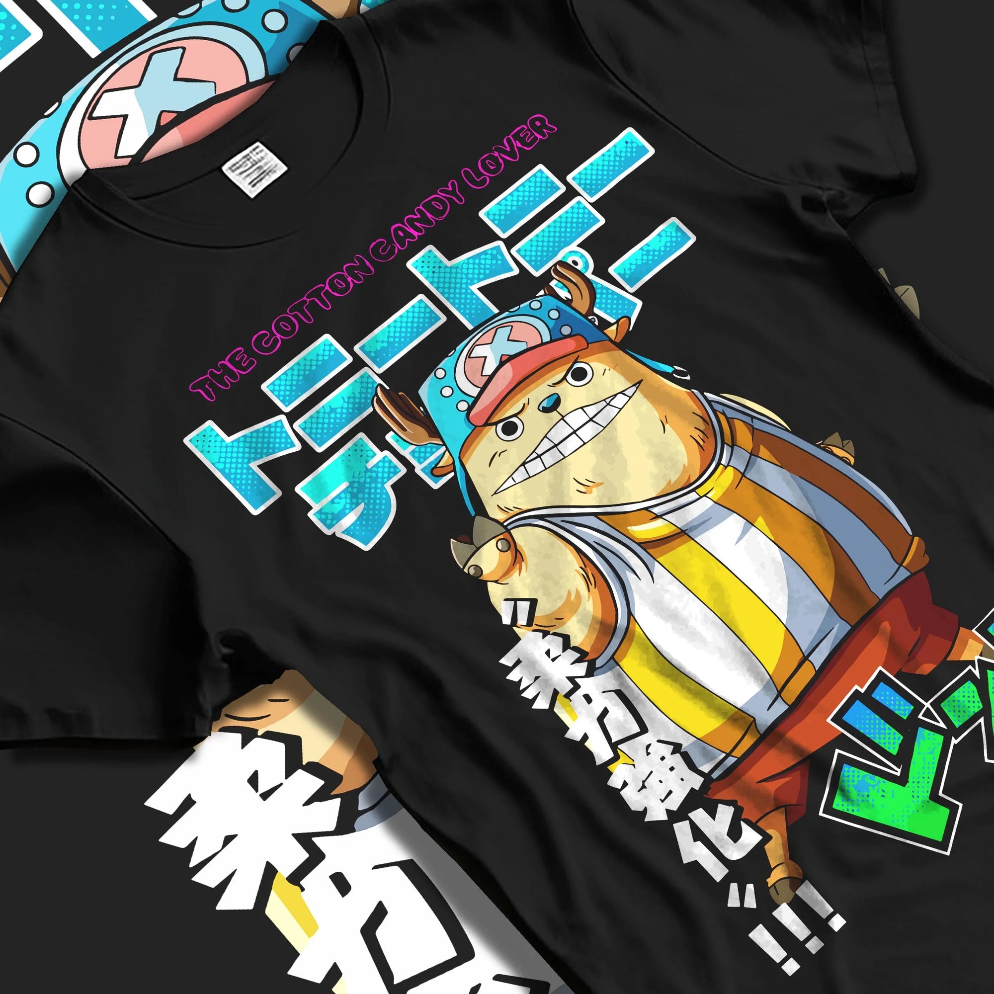 Black T-shirt laid flat with natural folds with Chopper Hoodie One Piece Pirate Straw Hat Crew Hero graphic bold anime graphic.