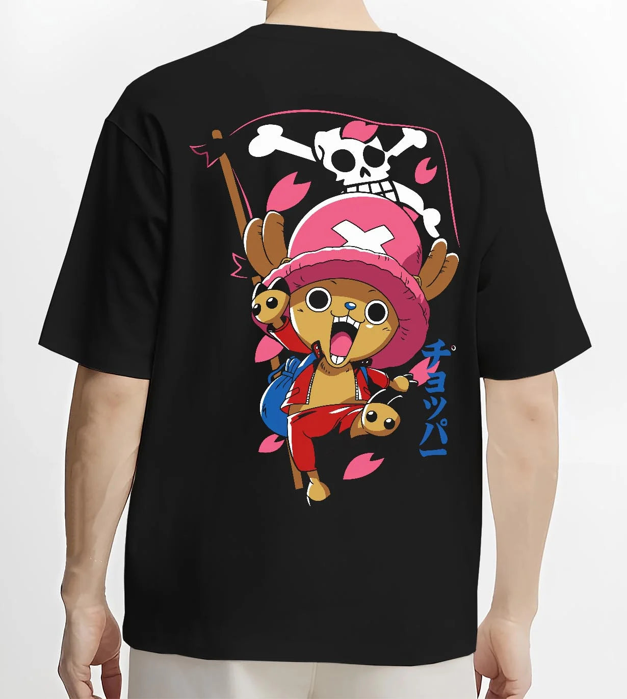Black T-shirt worn by male model, back view with Chopper Hoodie One Piece Doctor Pink Hat Skull Mark graphic bold anime graphic.