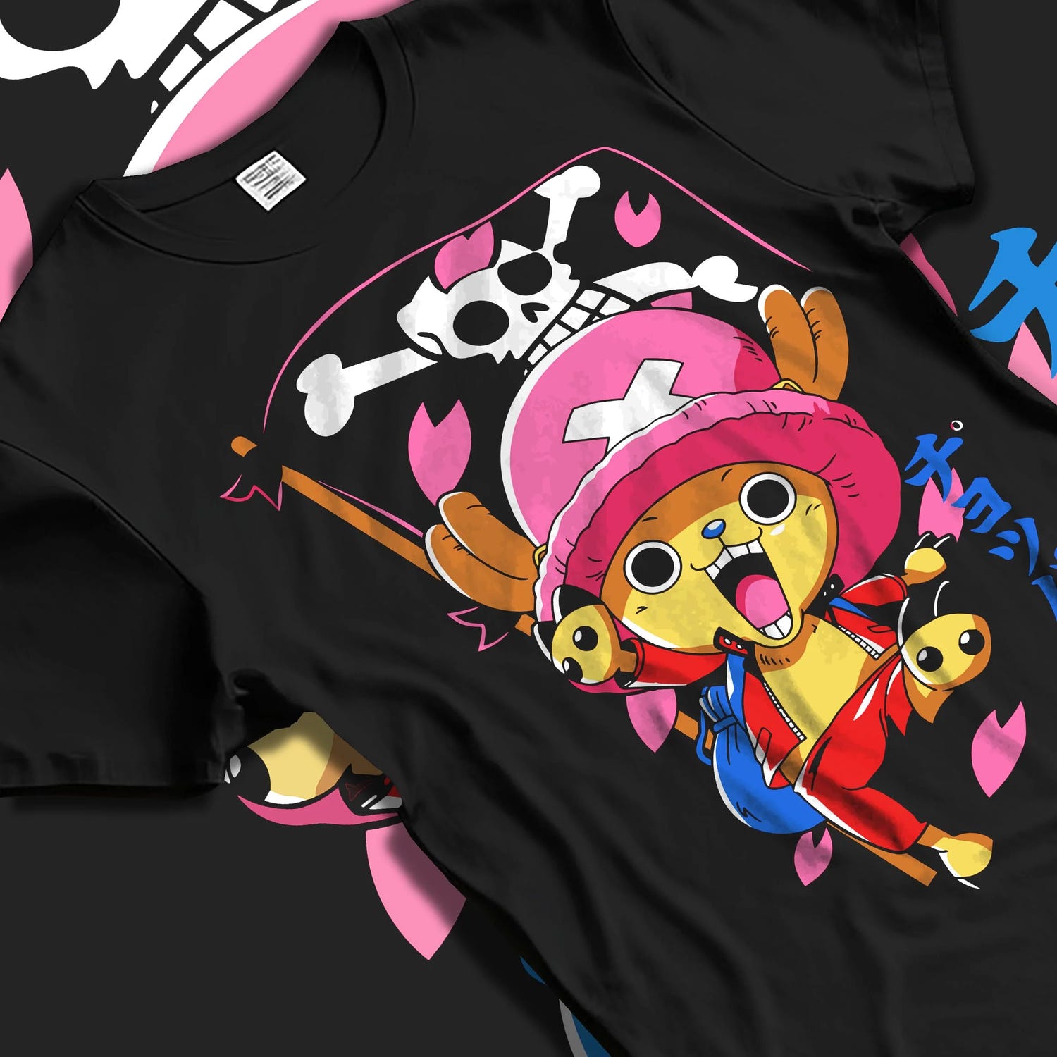 Black T-shirt laid flat with natural folds with Chopper Hoodie One Piece Doctor Pink Hat Skull Mark graphic streetwear graphic.
