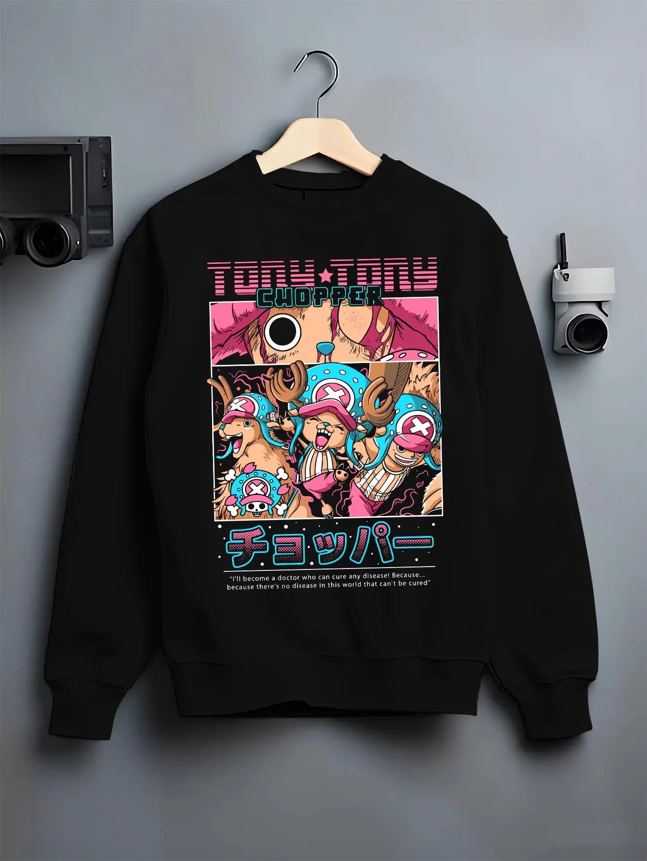 Black crewneck sweatshirt on hanger with Chopper Hoodie One Piece Doctor Retro Pirate Collage graphic streetwear graphic.