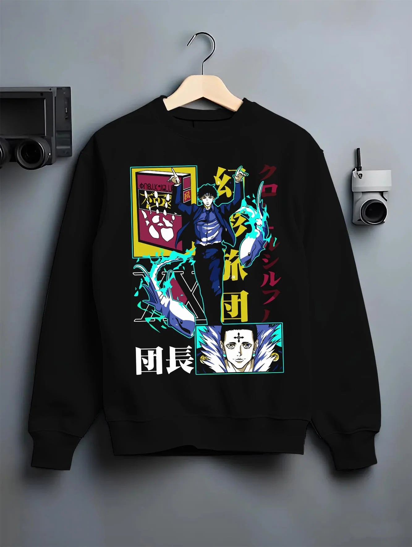 Black crewneck sweatshirt on hanger with Chrollo Hoodie Hunter x Hunter Phantom Troupe Power graphic streetwear graphic.