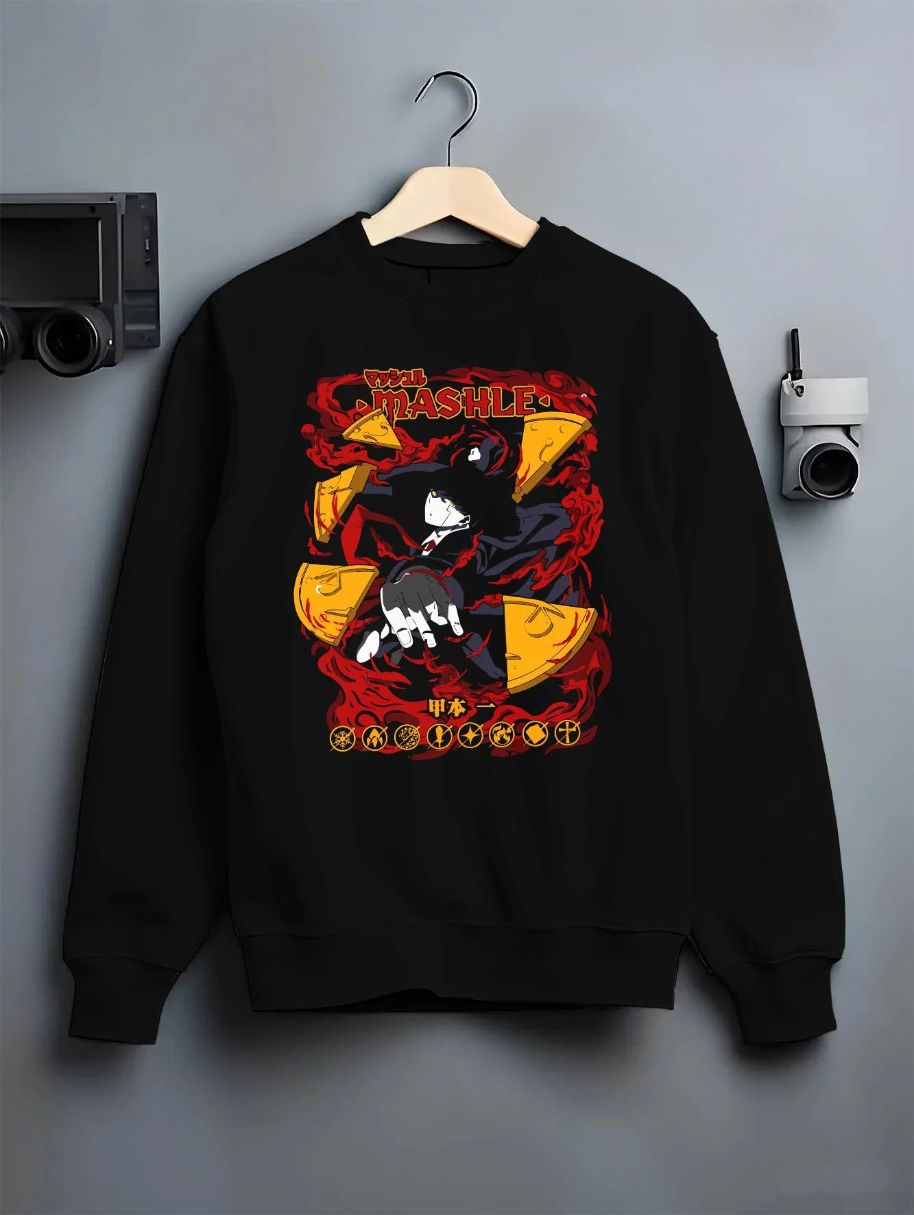 Black crewneck sweatshirt on hanger with Mashle Hoodie Mash Burnedead Action Comedy Jumper graphic bold anime graphic.
