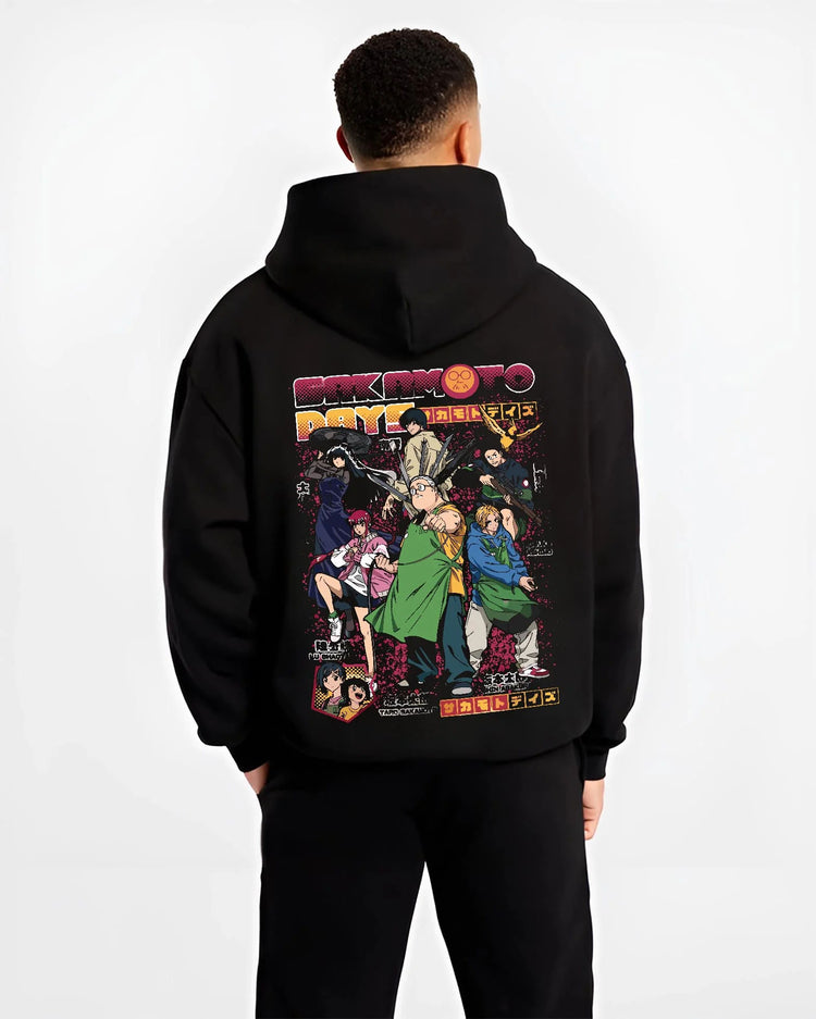 Black hoodie worn by male model from the back featuring Sakamoto Days cast group action artwork.