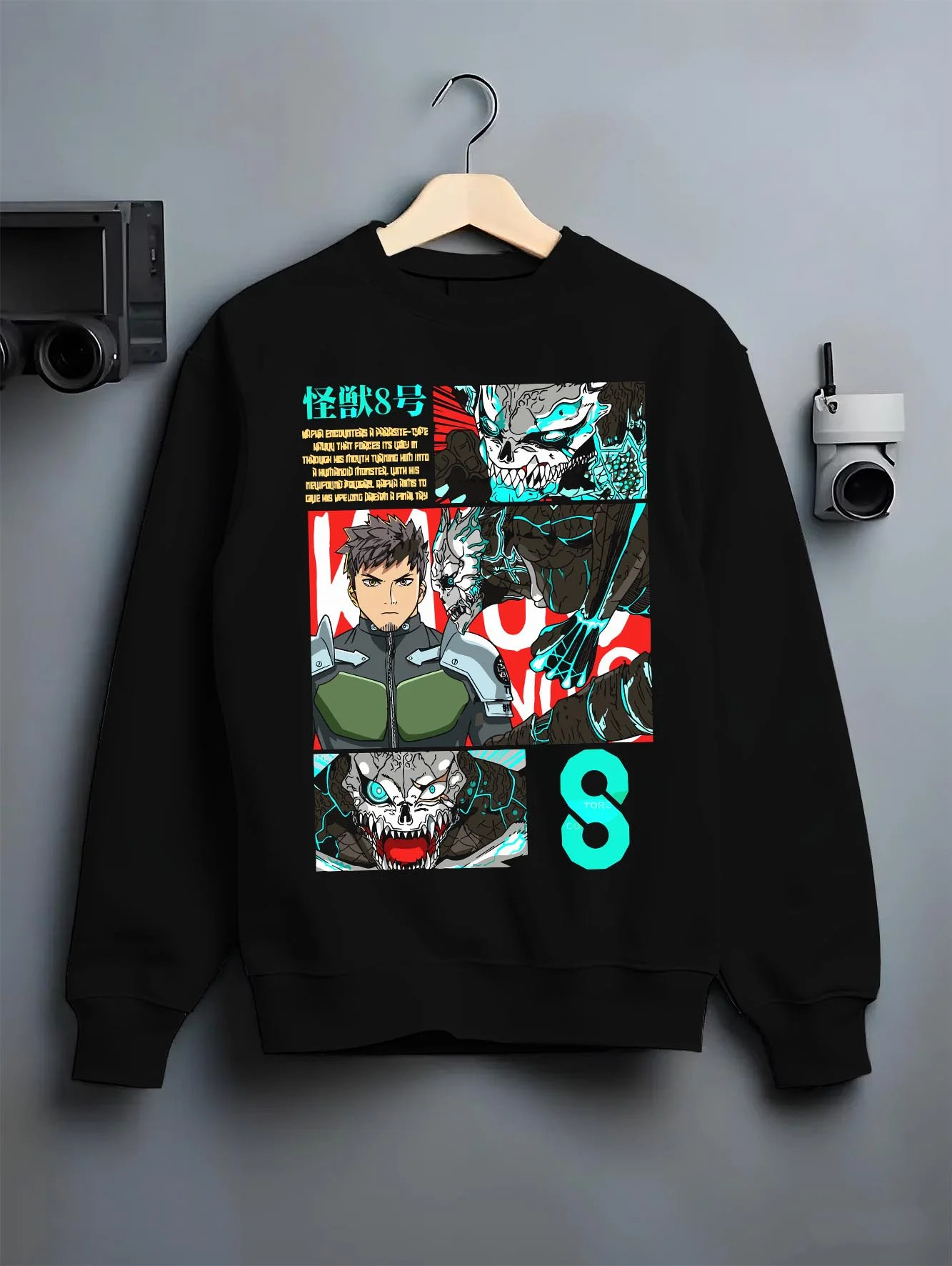 Black crewneck sweatshirt on hanger with Kaiju No. 8 Hoodie Kafka Hibino Defence Unit Jumper graphic bold anime graphic.