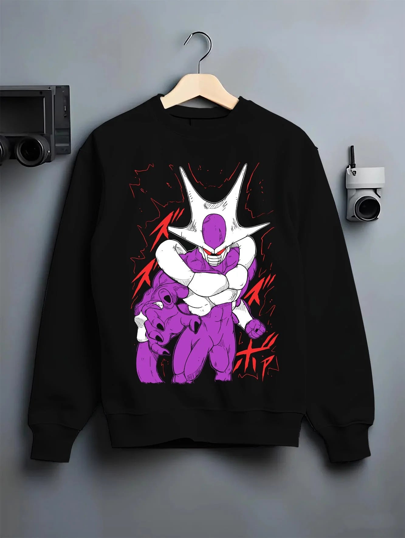 Black crewneck sweatshirt on hanger with Cooler Hoodie Dragon Ball Z Villain Transformation graphic streetwear graphic.