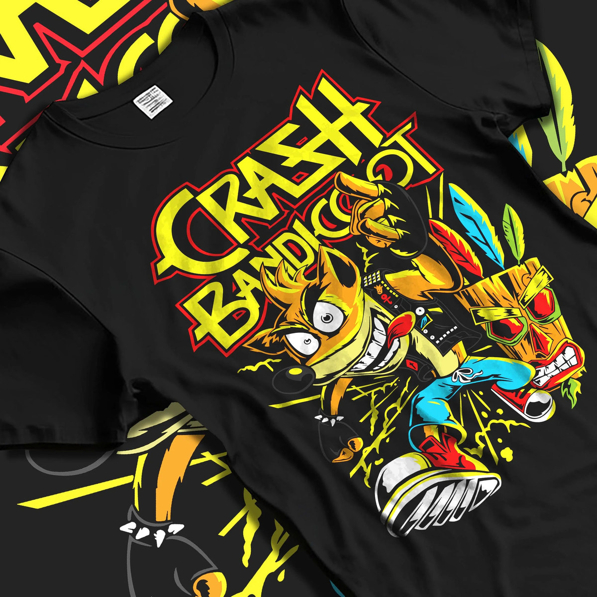 Black T-shirt laid flat with natural folds featuring Crash Bandicoot retro gaming spin action artwork.