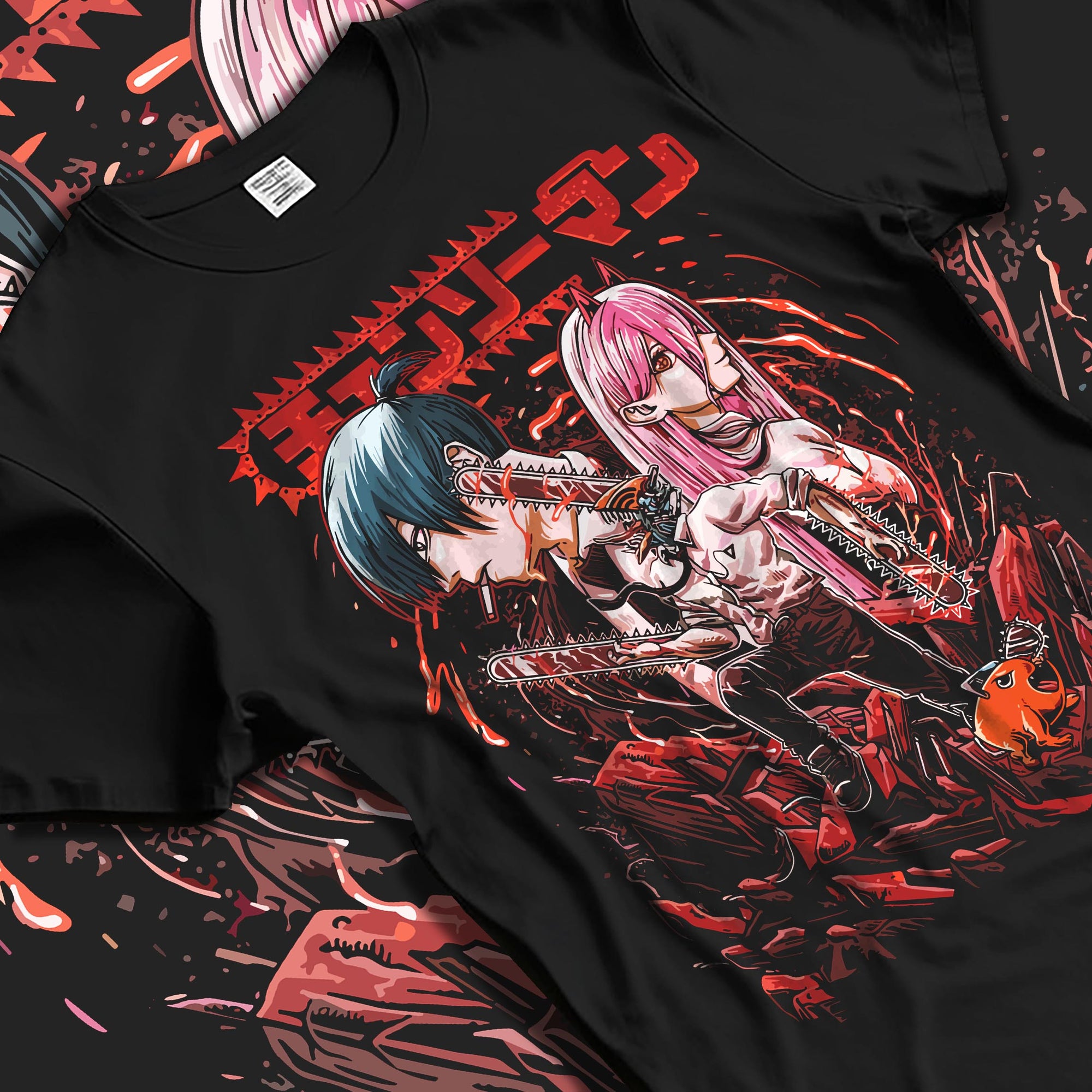 Black T-shirt laid flat with natural fabric folds, featuring Chainsaw Man anime poster inspired design of Aki and Power in retro manga horror panel style.