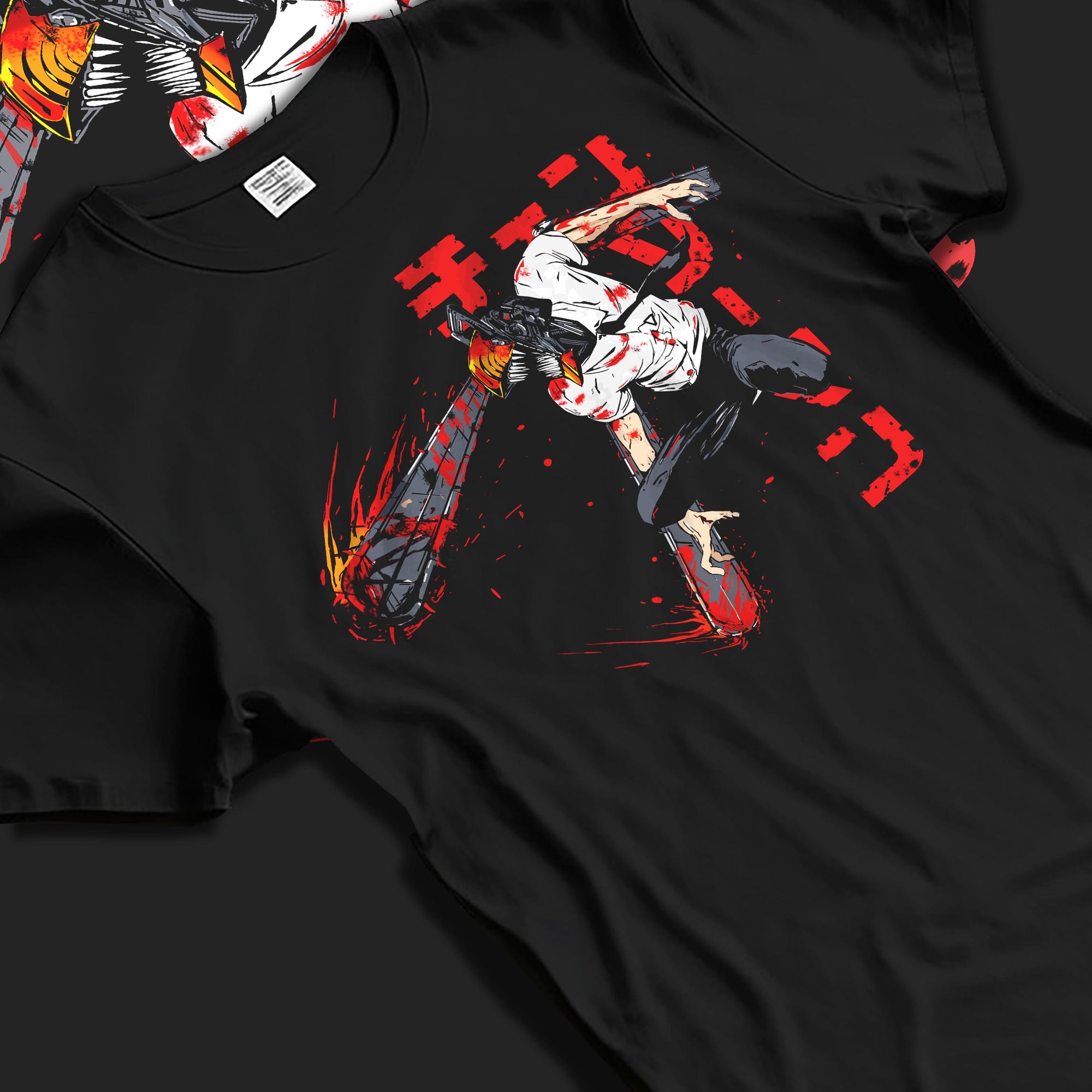 Black T-shirt laid flat with natural fabric folds, featuring Chainsaw Man Denji anime poster inspired graphic with retro manga artwork print and shonen battle aesthetic design.