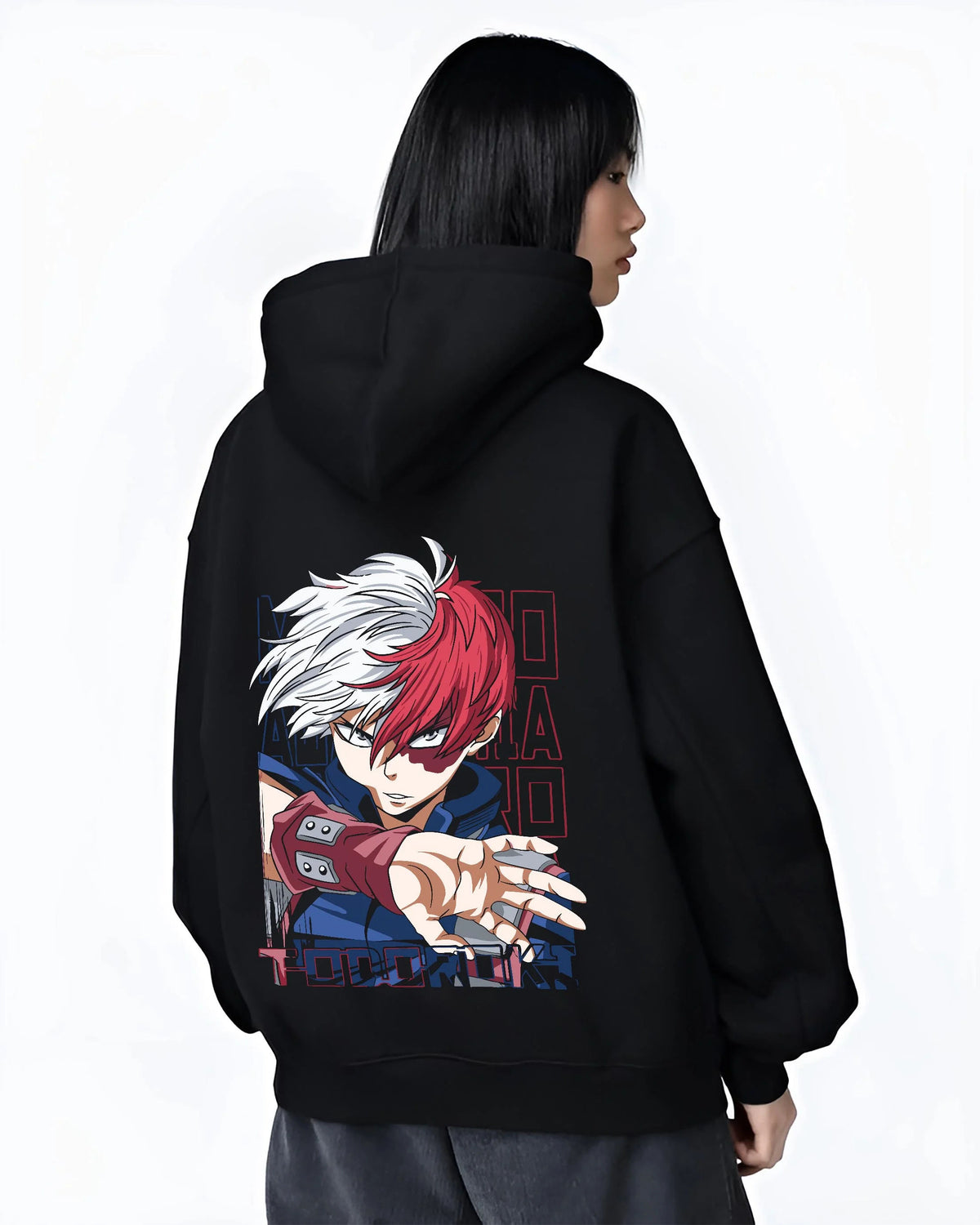Black hoodie worn by female model from the back featuring Shoto Todoroki My Hero Academia fire and ice artwork.