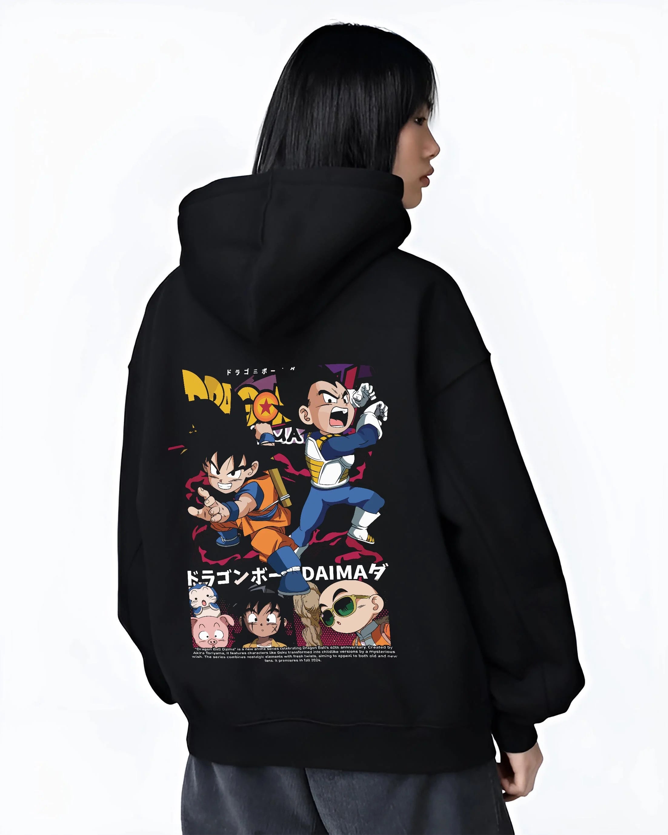 Black hoodie worn by female model, back view with Dragon Ball Hoodie Daima Series Chibi Retro Poster graphic streetwear graphic.