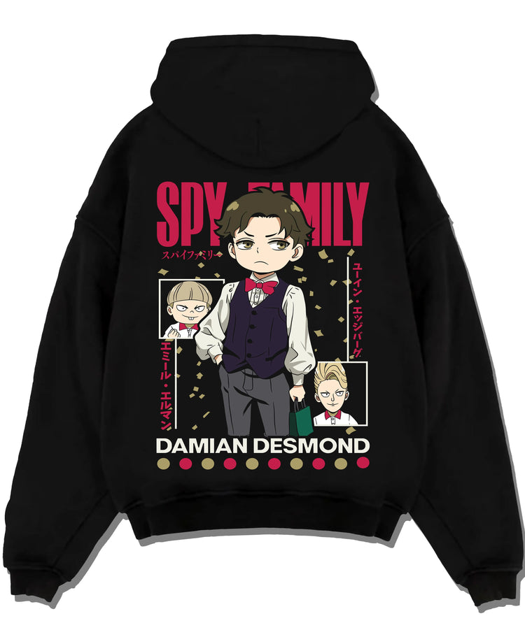 Black pullover hoodie laid flat with Damian Hoodie Spy x Family Desmond School Retro Scene graphic bold anime graphic.