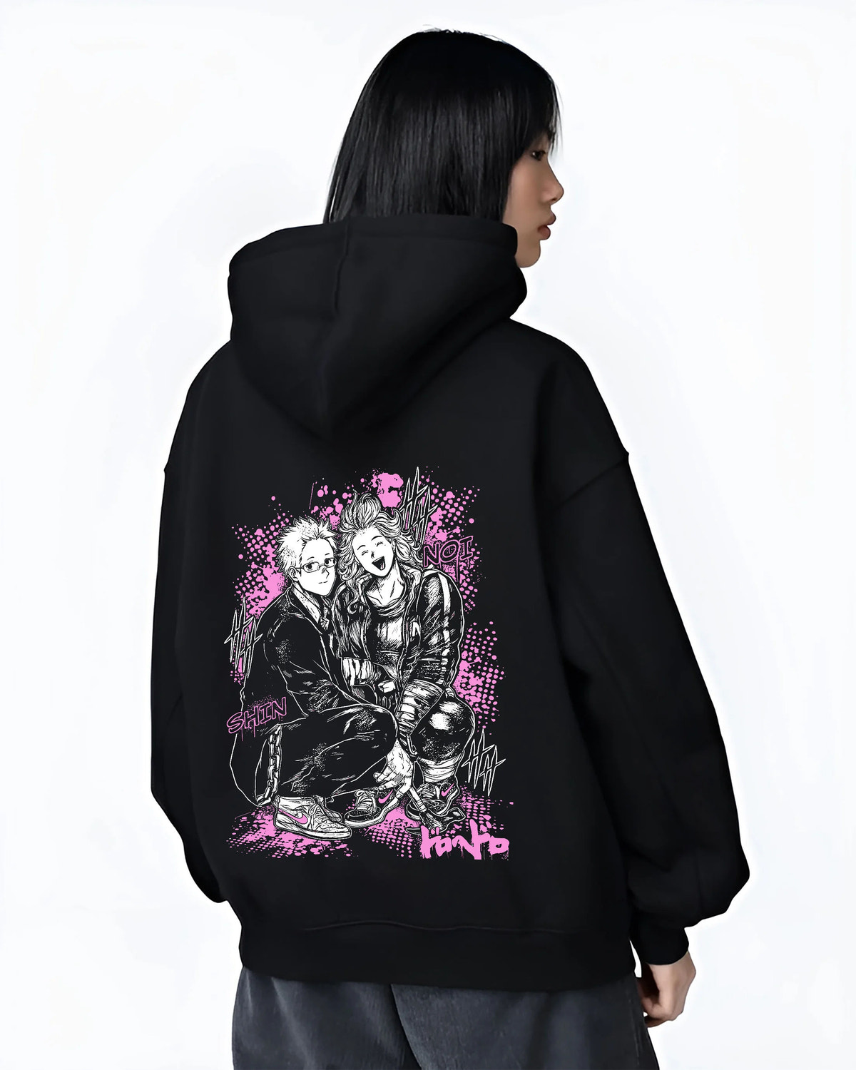 Black hoodie female model back view showing Dandadan: Okarun and Momo duo