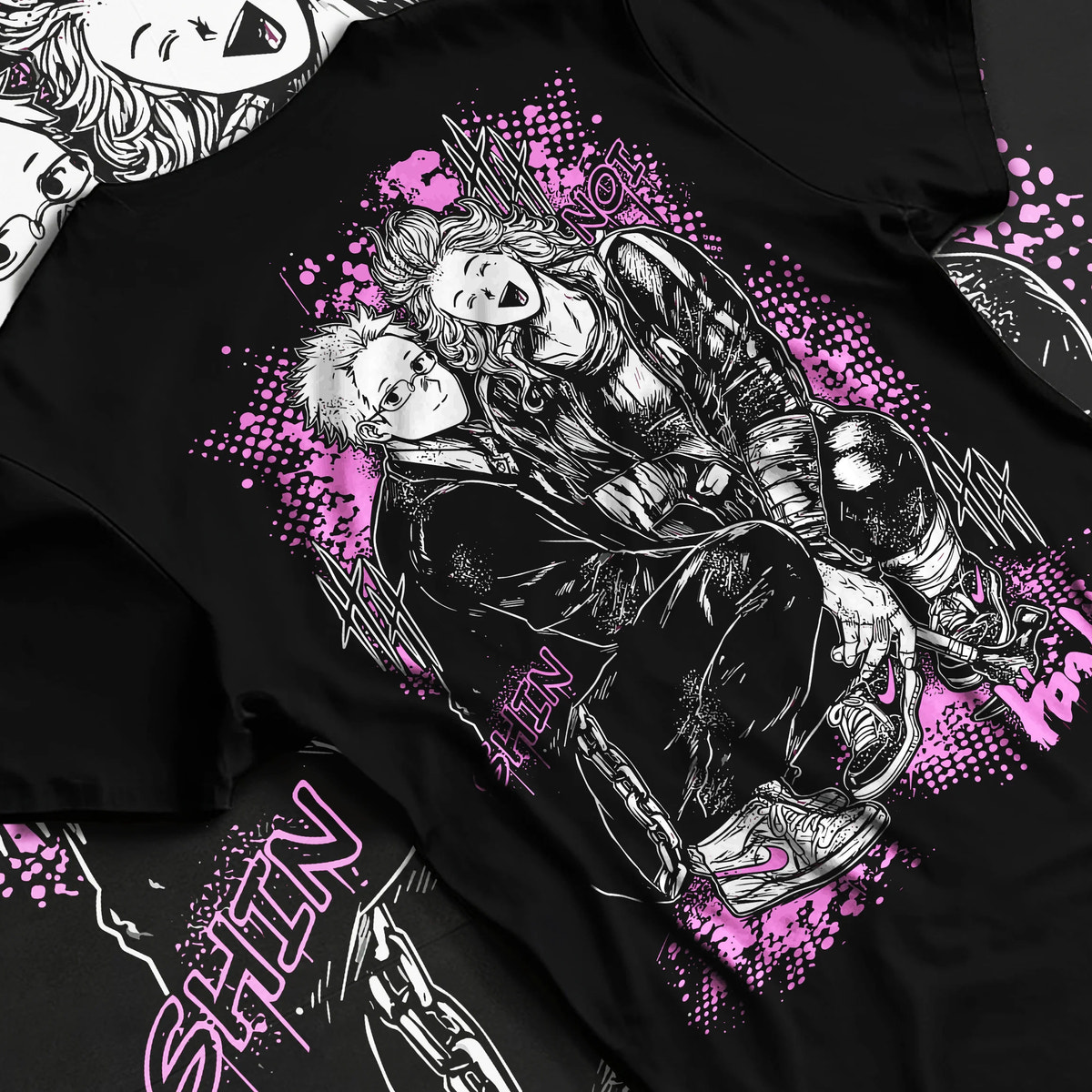 Black T-shirt flat back view showing Dandadan: Okarun and Momo duo