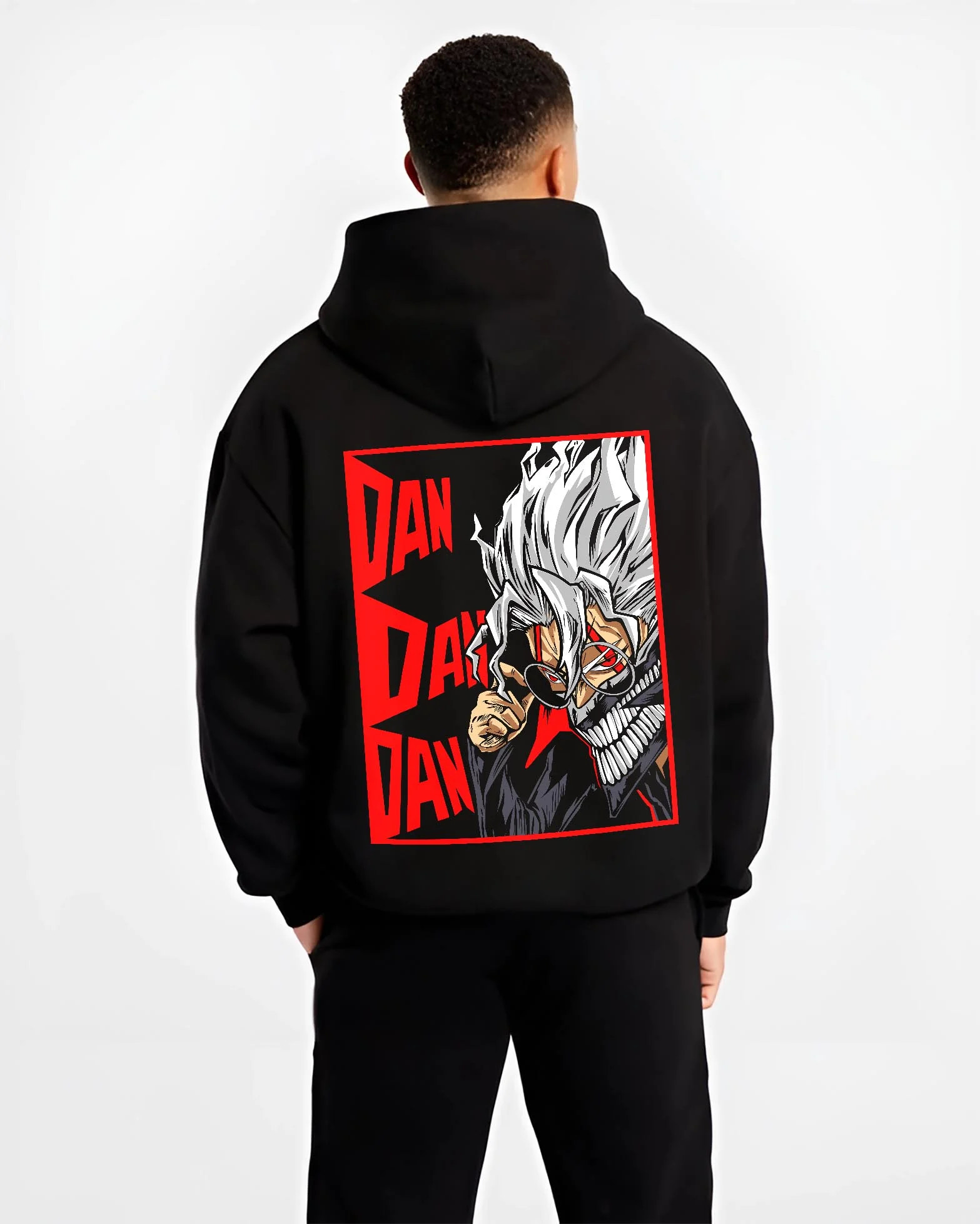 Black hoodie worn by male model, back view with Ken Spirit Clash Hoodie Dandadan Turbo Granny Mode graphic bold anime graphic.