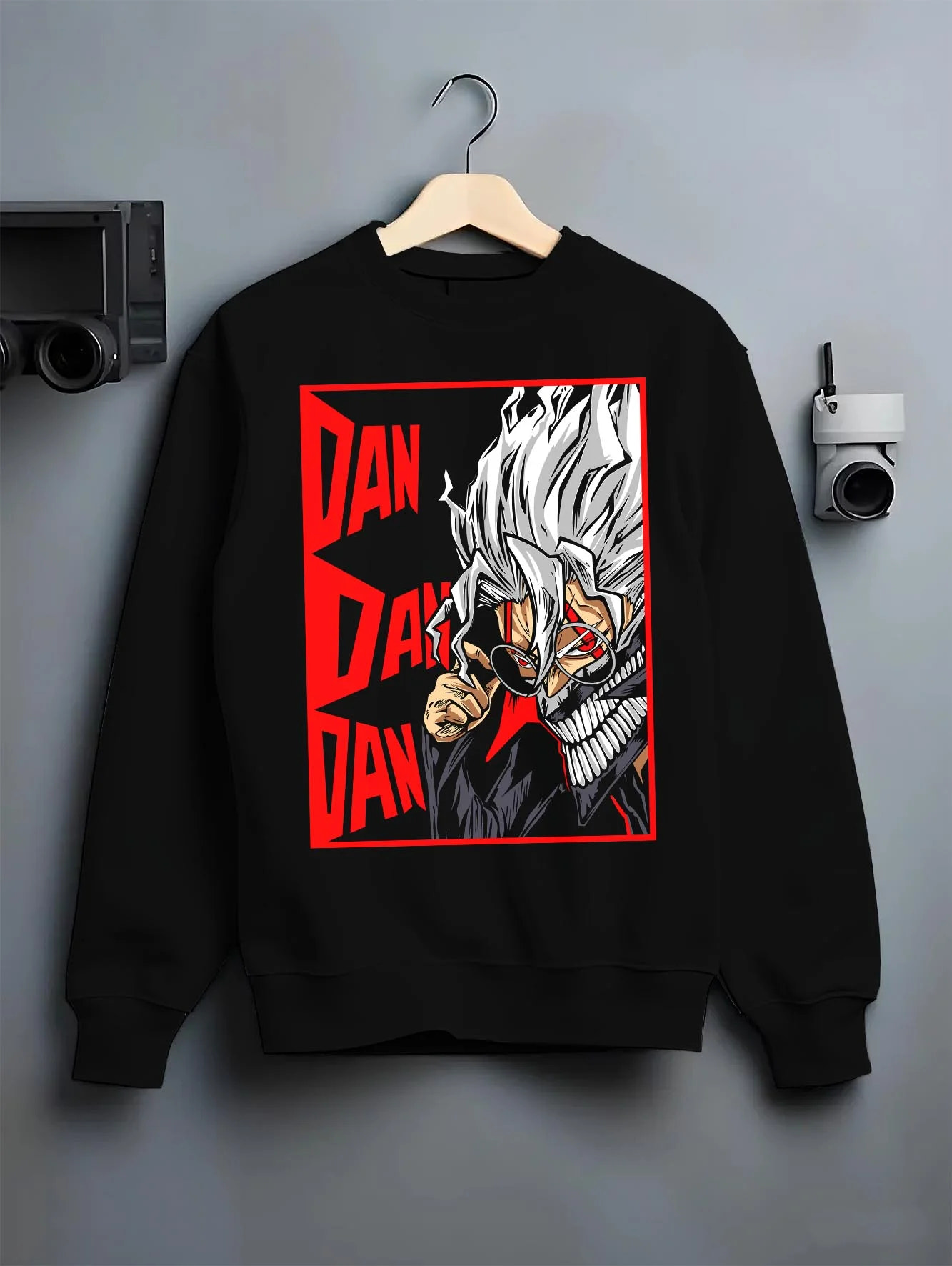 Black crewneck sweatshirt on hanger with Ken Spirit Clash Hoodie Dandadan Turbo Granny Mode graphic premium wear.