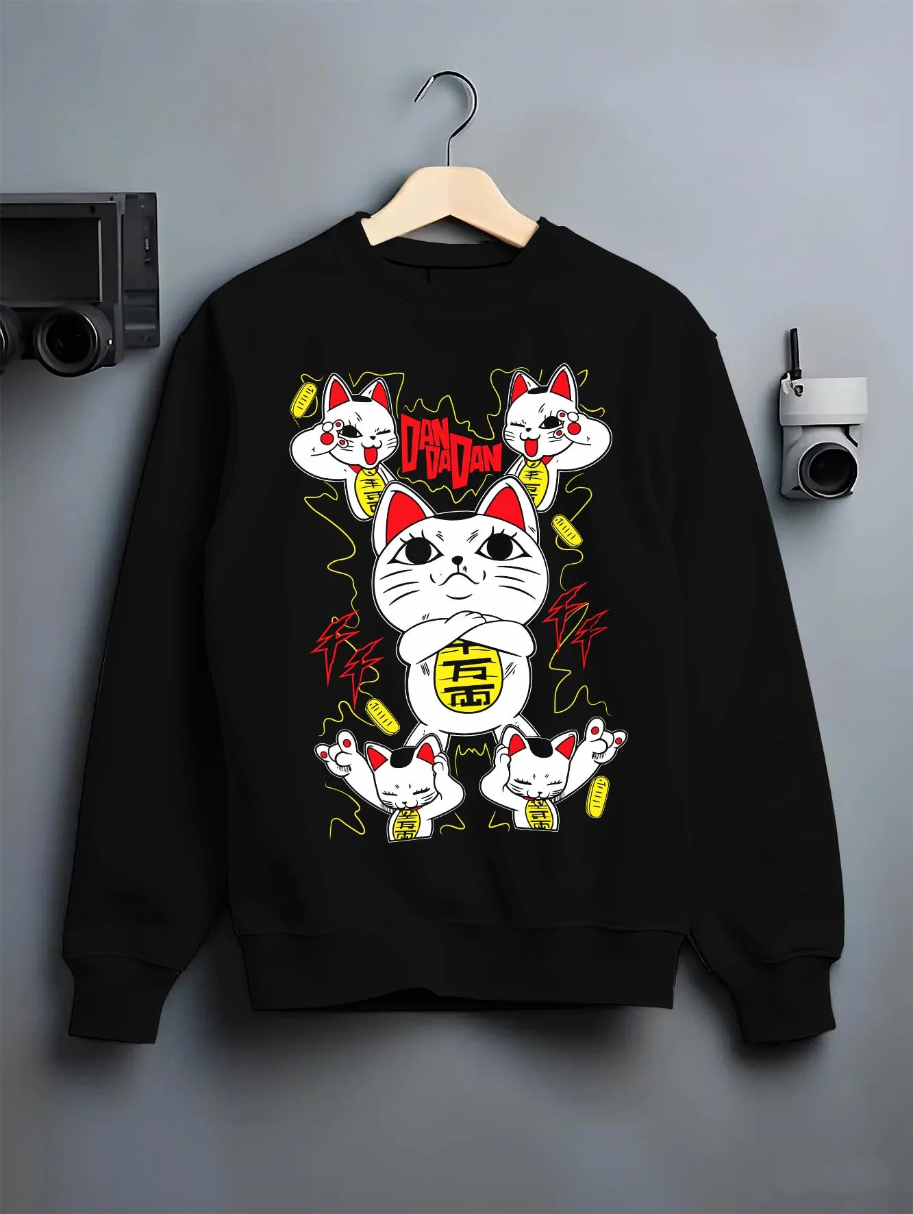 Black crewneck sweatshirt on hanger with Turbo Granny Hoodie Dandadan Paranormal Spirit Form graphic premium wear.