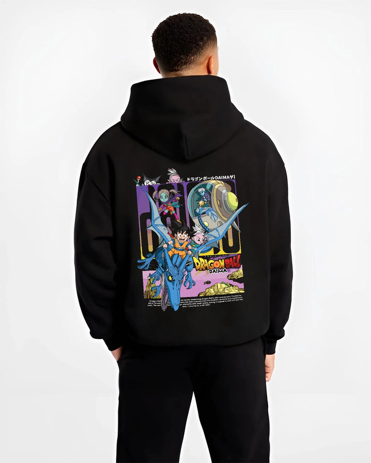 Black hoodie worn by male model, back view with Dragon Ball Hoodie Daima Anime Retro Poster Scene graphic streetwear graphic.