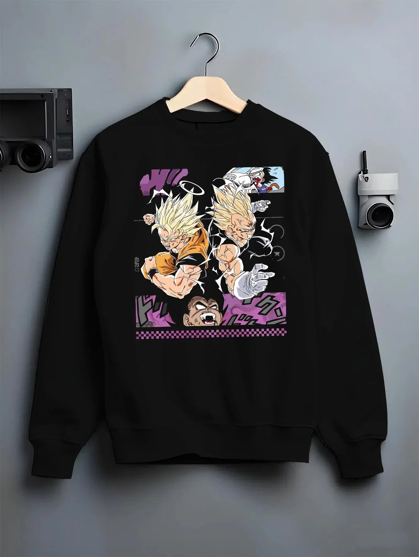 Black crewneck sweatshirt on hanger with Goku Hoodie Dragon Ball Z Super Saiyan Epic Pose graphic premium wear.